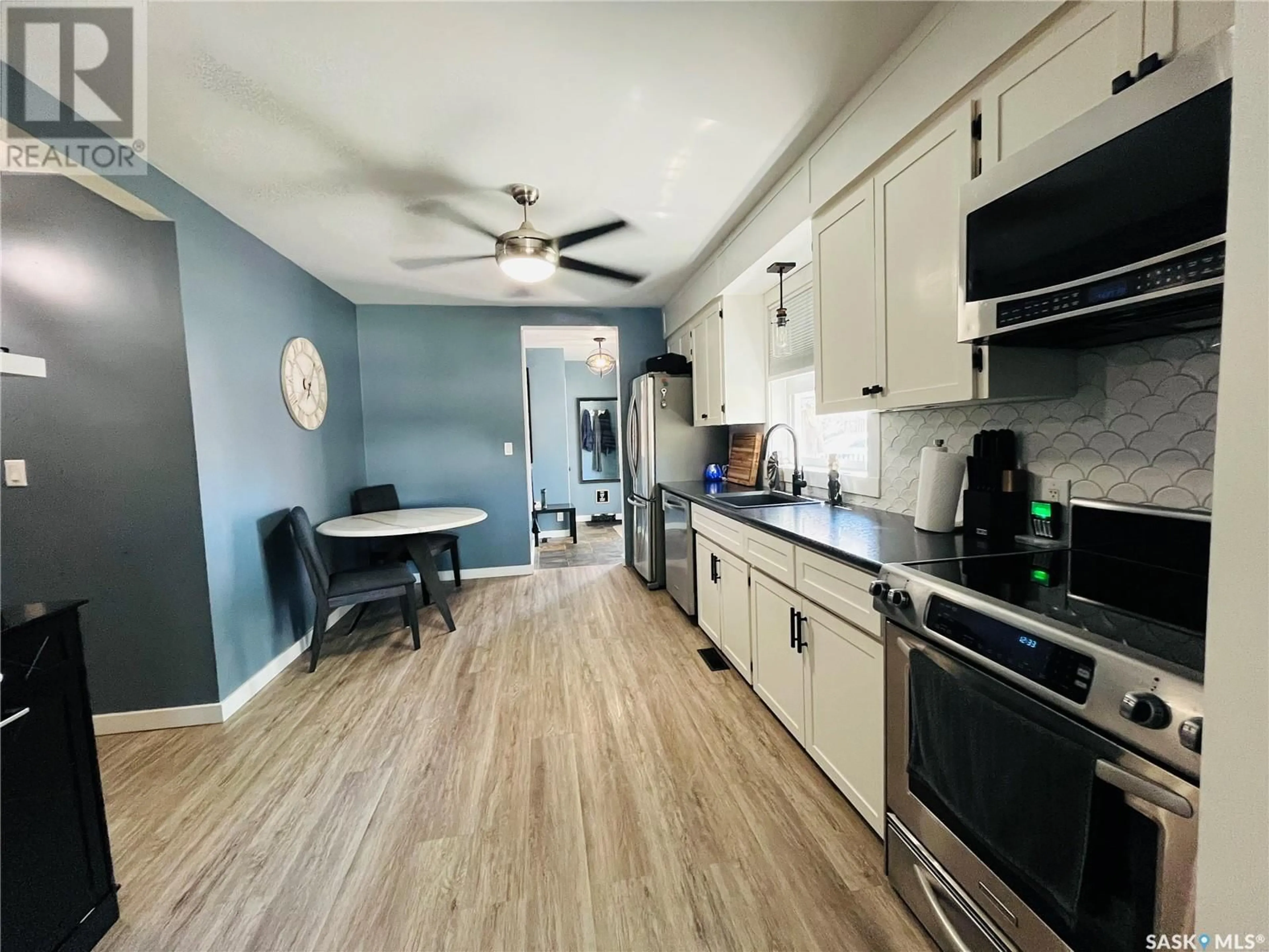 Open concept kitchen, unknown for 103 6TH AVENUE, Swift Current Saskatchewan S9H2L9