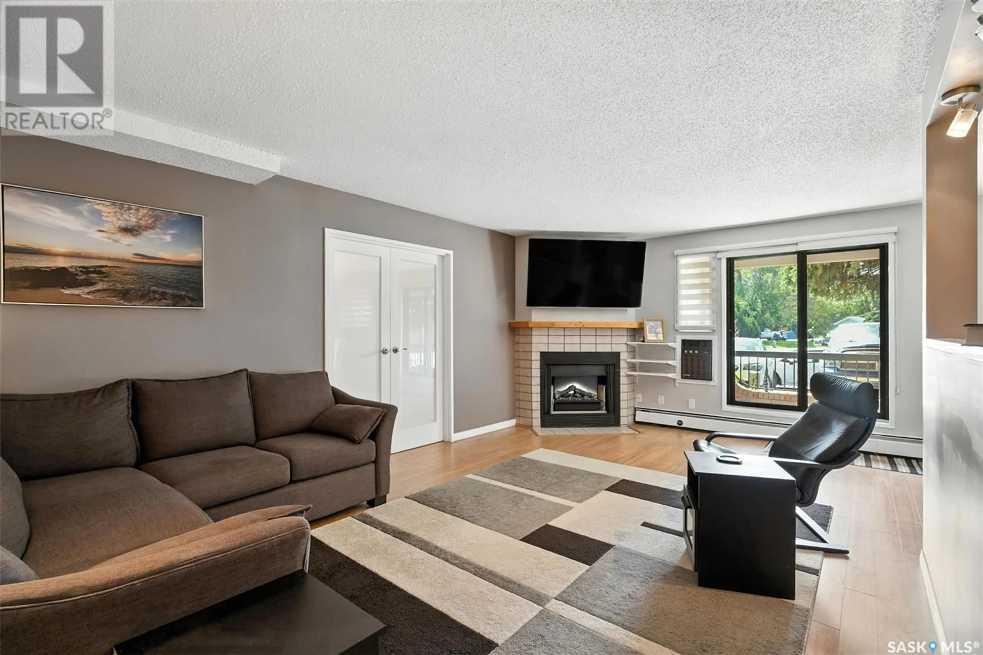 Living room with furniture, unknown for 209A - 110 CREE PLACE, Saskatoon Saskatchewan S7K7Y9