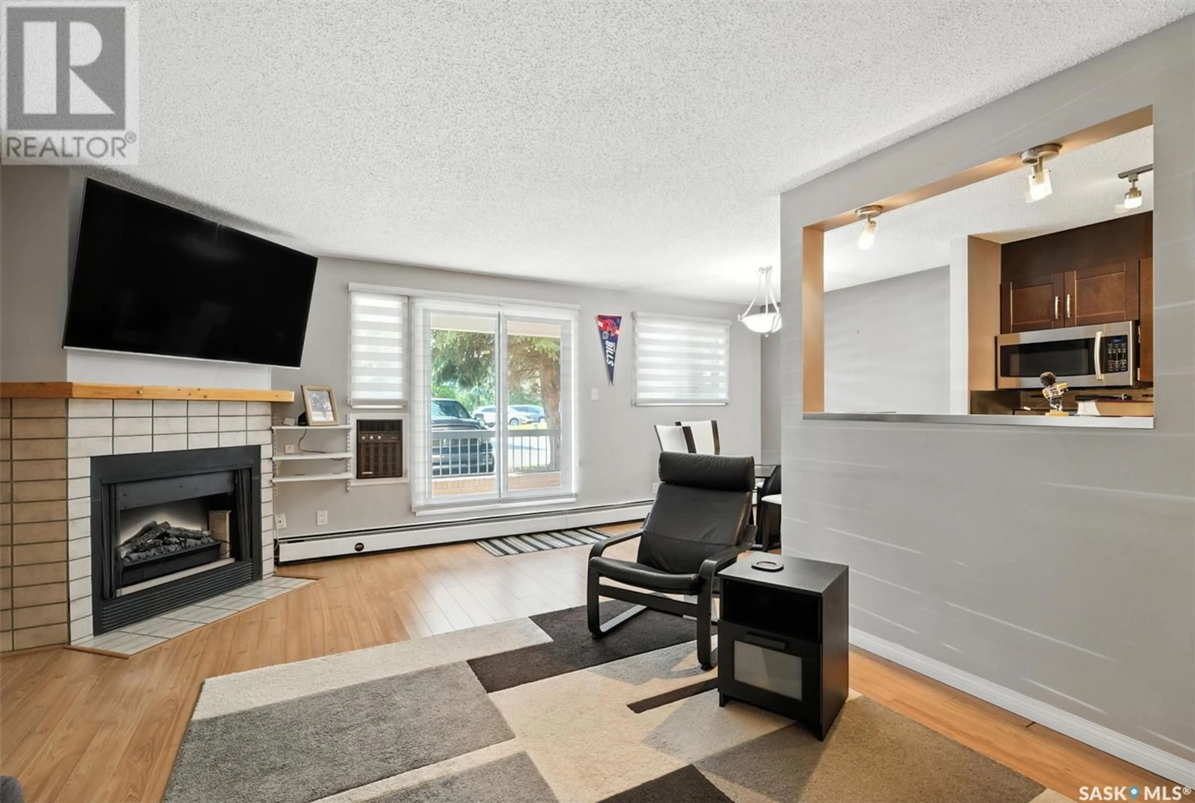 Living room with furniture, unknown for 209A - 110 CREE PLACE, Saskatoon Saskatchewan S7K7Y9