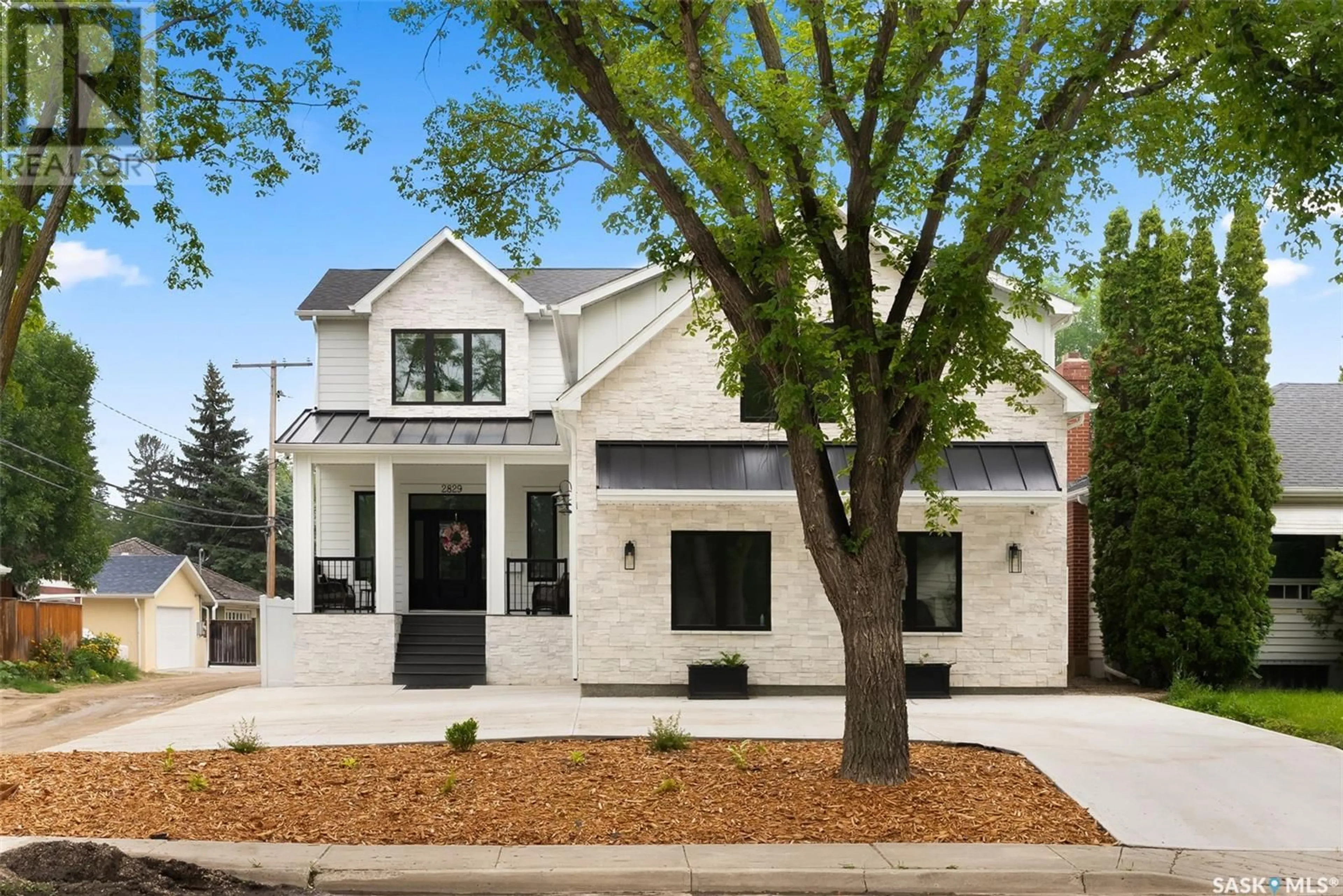 Home with brick exterior material, street for 2829 GARNET STREET, Regina Saskatchewan S4S1X1