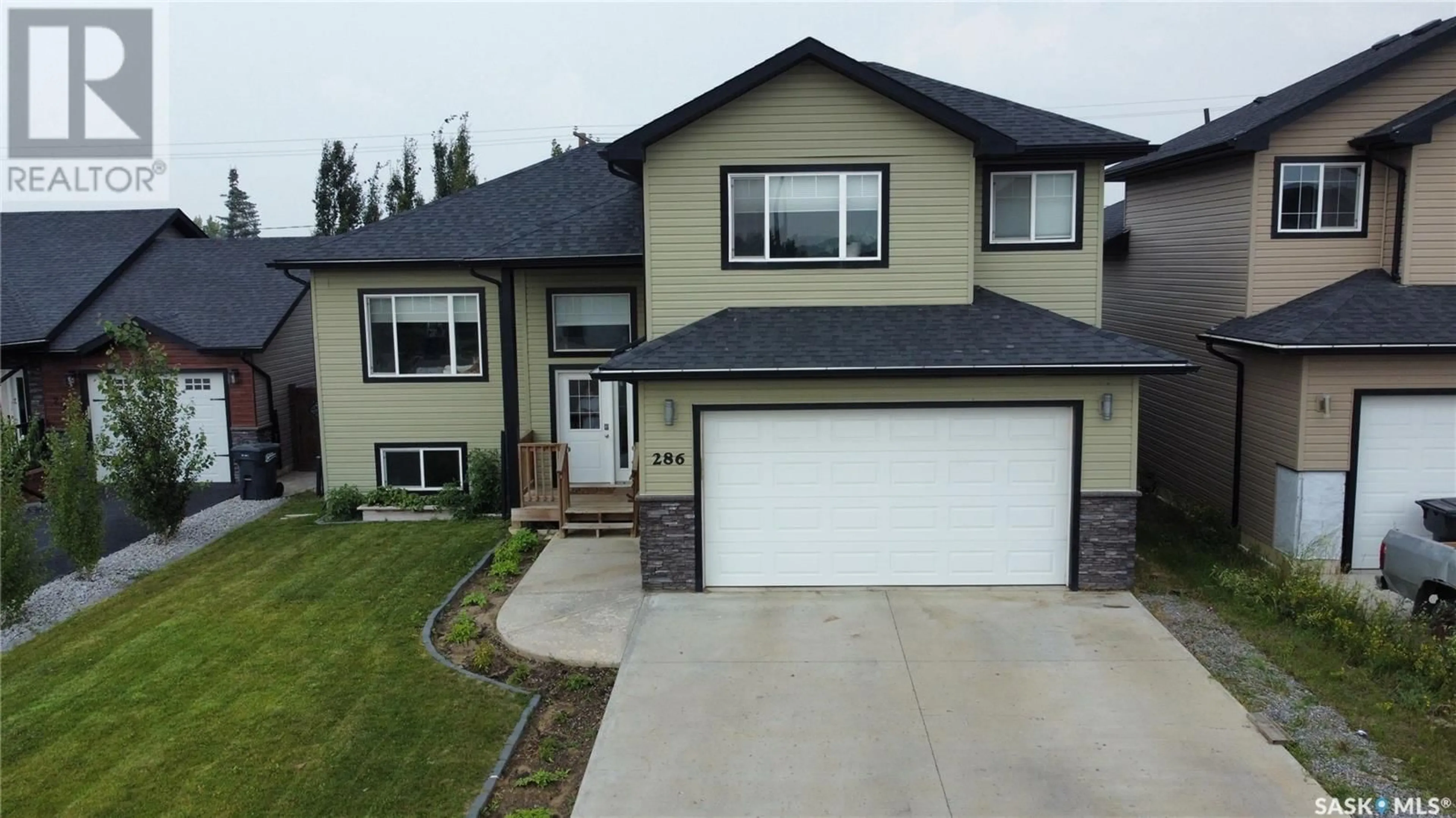 Home with vinyl exterior material, street for 286 15TH STREET, Battleford Saskatchewan S0M0E0