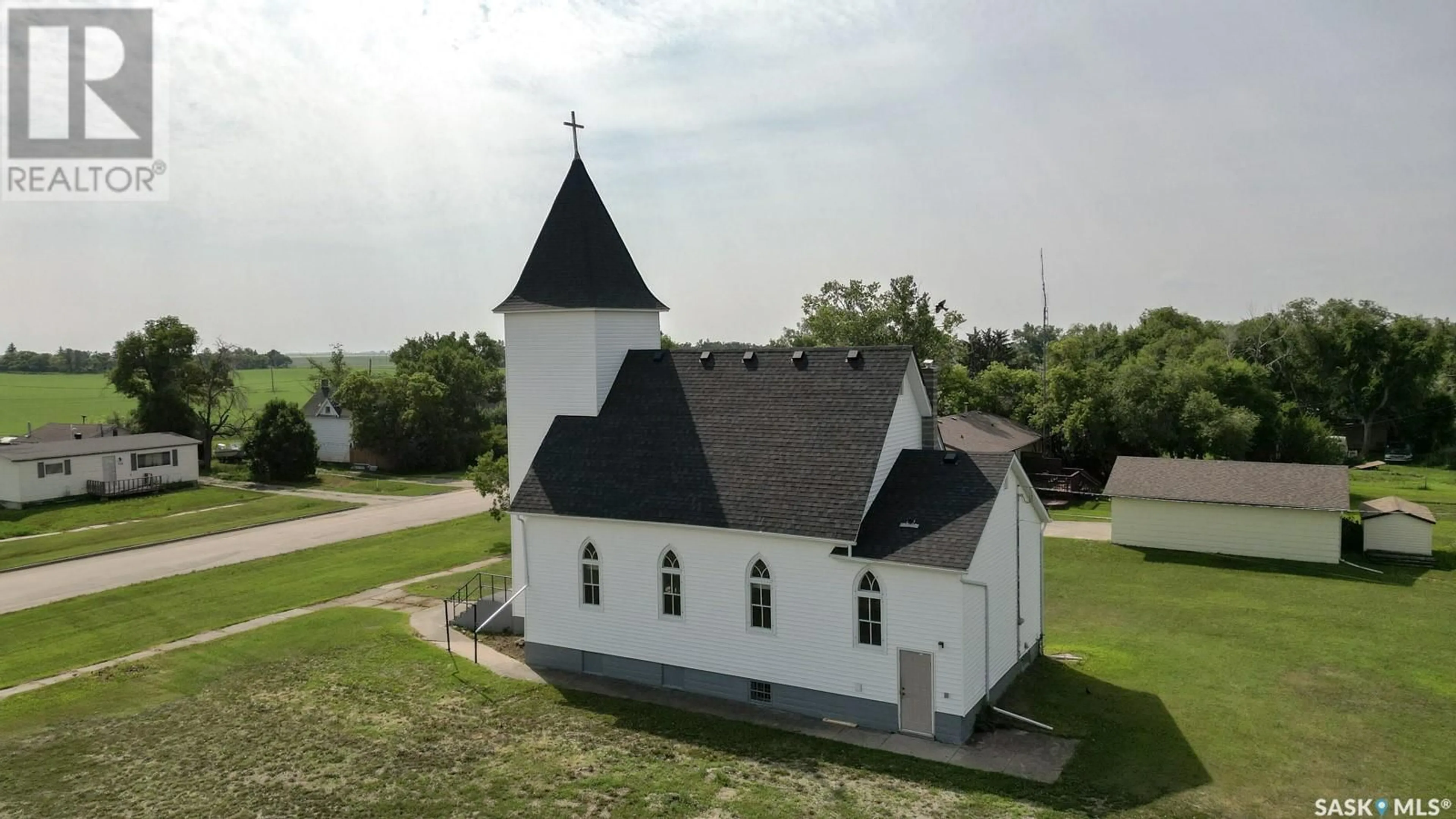 A pic from outside/outdoor area/front of a property/back of a property/a pic from drone, building for 229 VICTORIA STREET, Lang Saskatchewan S0G2W0