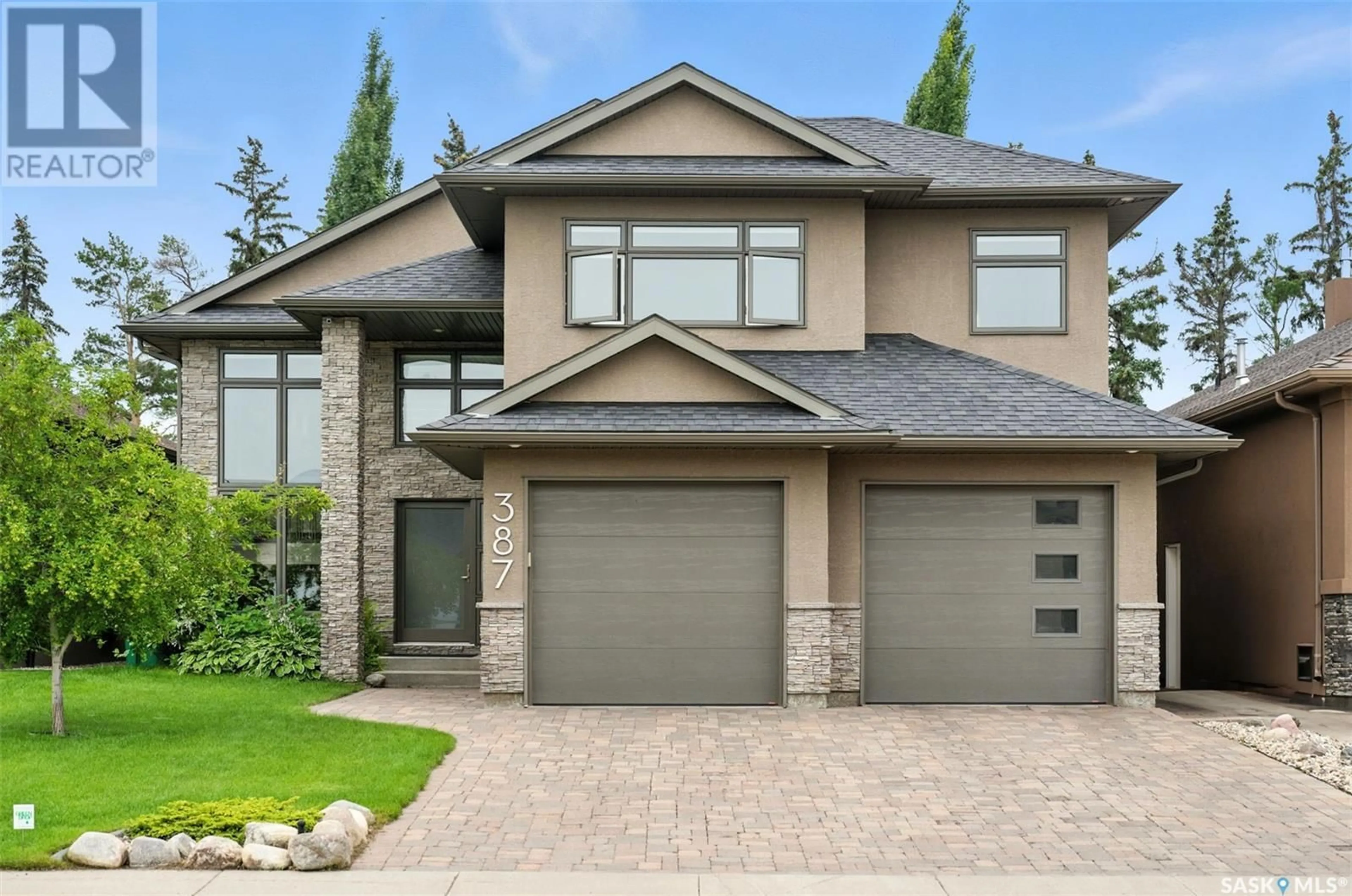 Home with brick exterior material, street for 387 ATTON CRESCENT, Saskatoon Saskatchewan S7W0K7