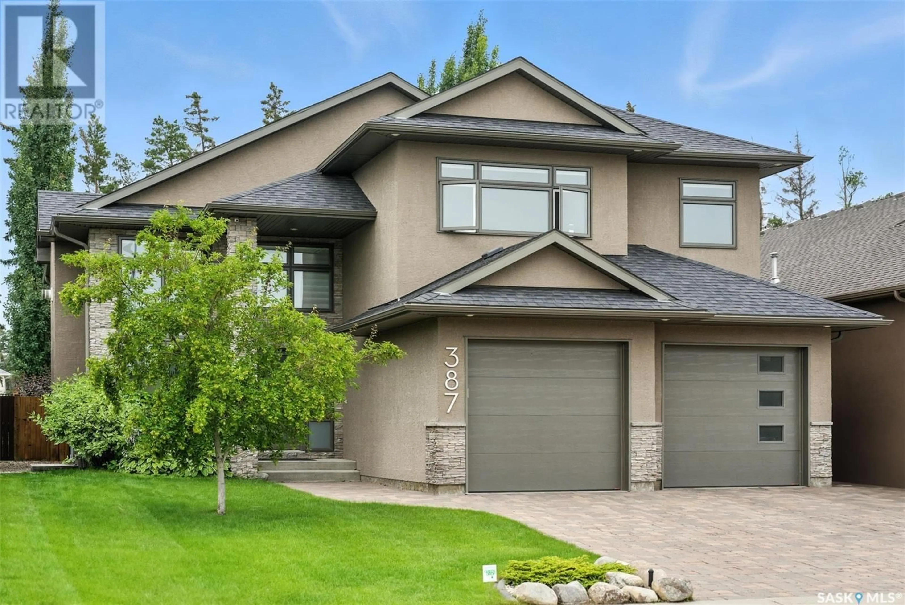Home with brick exterior material, street for 387 ATTON CRESCENT, Saskatoon Saskatchewan S7W0K7