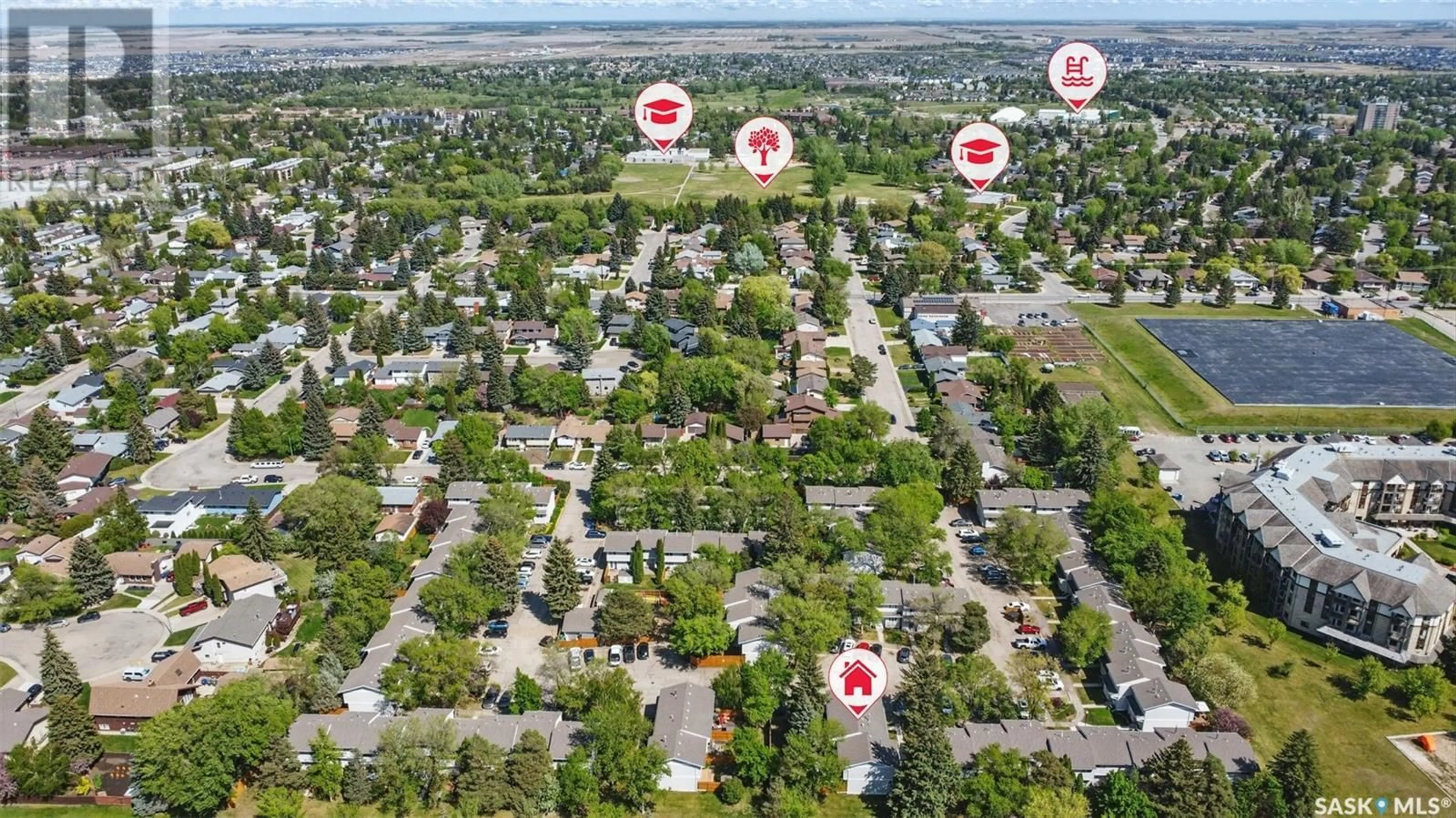 A pic from outside/outdoor area/front of a property/back of a property/a pic from drone, street for 70 330 HAIGHT CRESCENT, Saskatoon Saskatchewan S7H4V9
