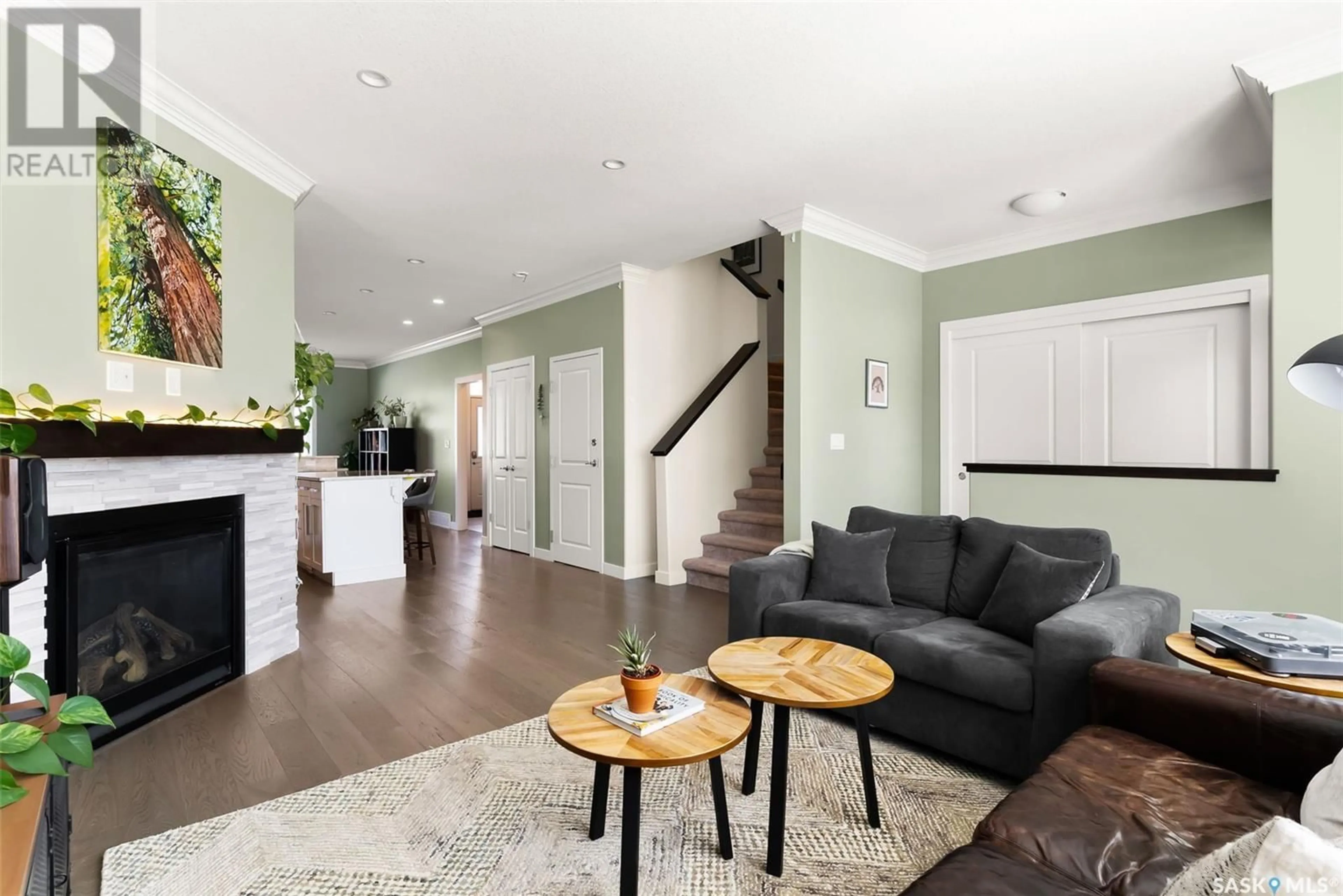 Living room with furniture, wood/laminate floor for 3124 HILL AVENUE, Regina Saskatchewan S4S0W3