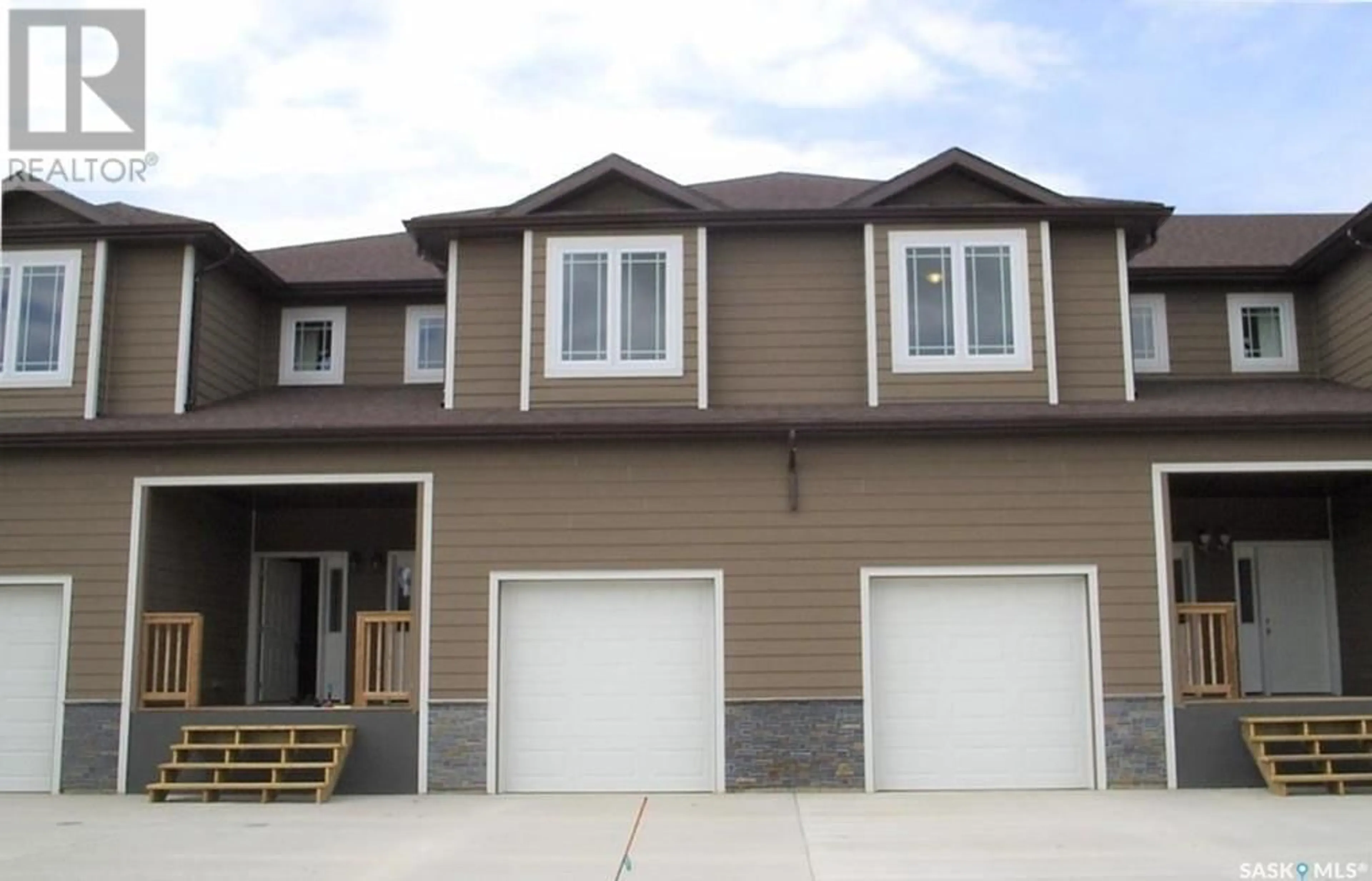 Home with vinyl exterior material, street for 34 MCKENZIE LANE, White City Saskatchewan S4L0B2