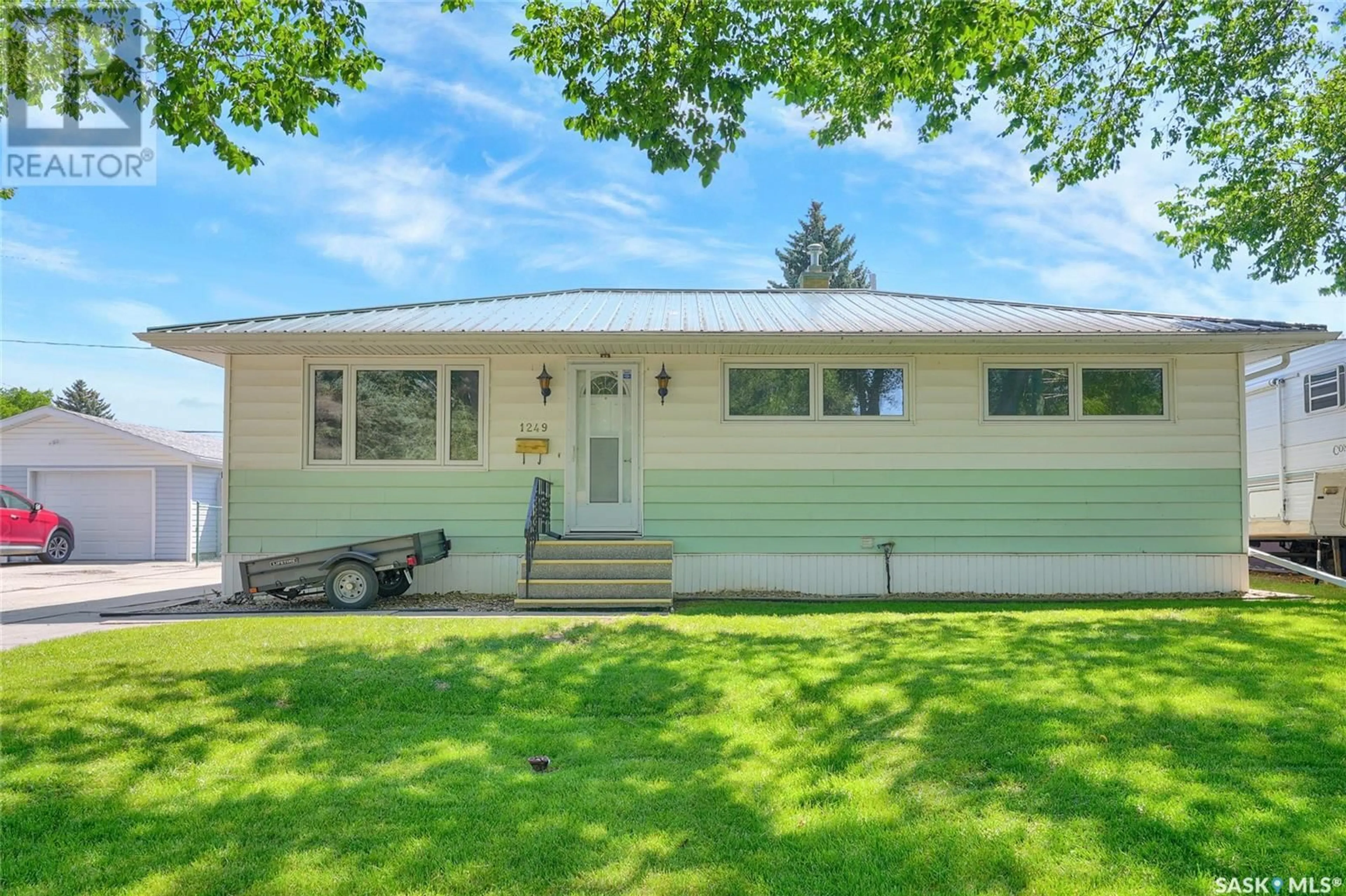 Home with vinyl exterior material, street for 1249 ALBERT STREET, Moose Jaw Saskatchewan S6H2Y5