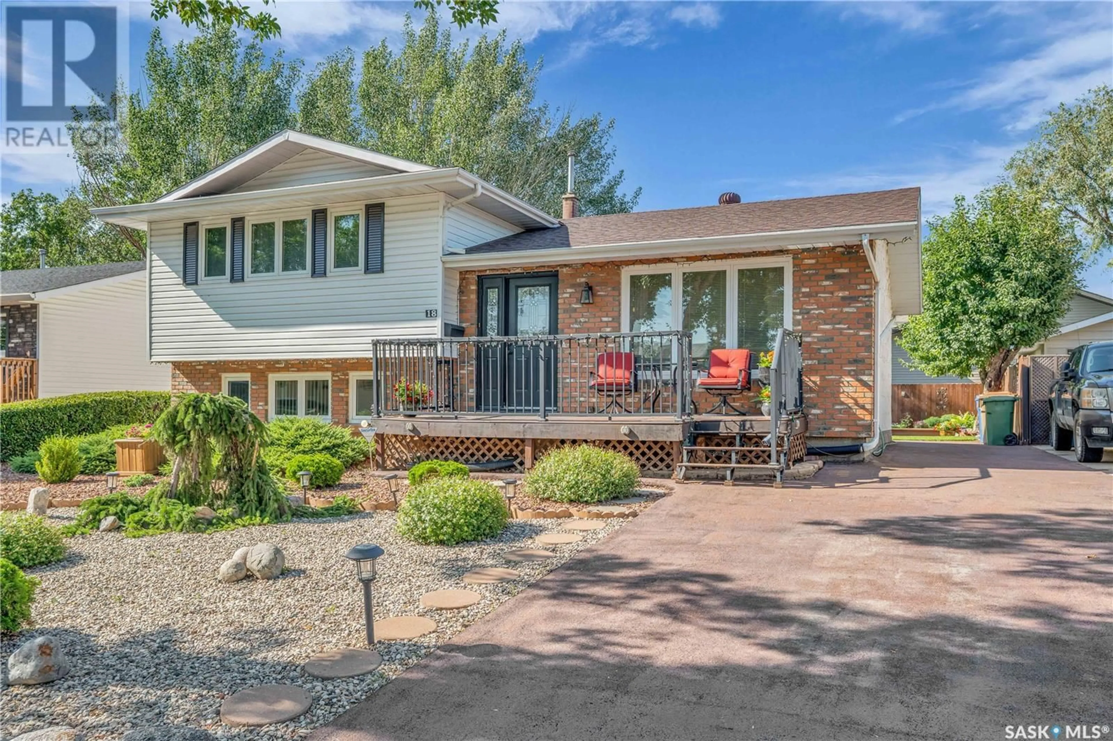 Home with brick exterior material, street for 18 CATHERWOOD CRESCENT, Regina Saskatchewan S4R7A7