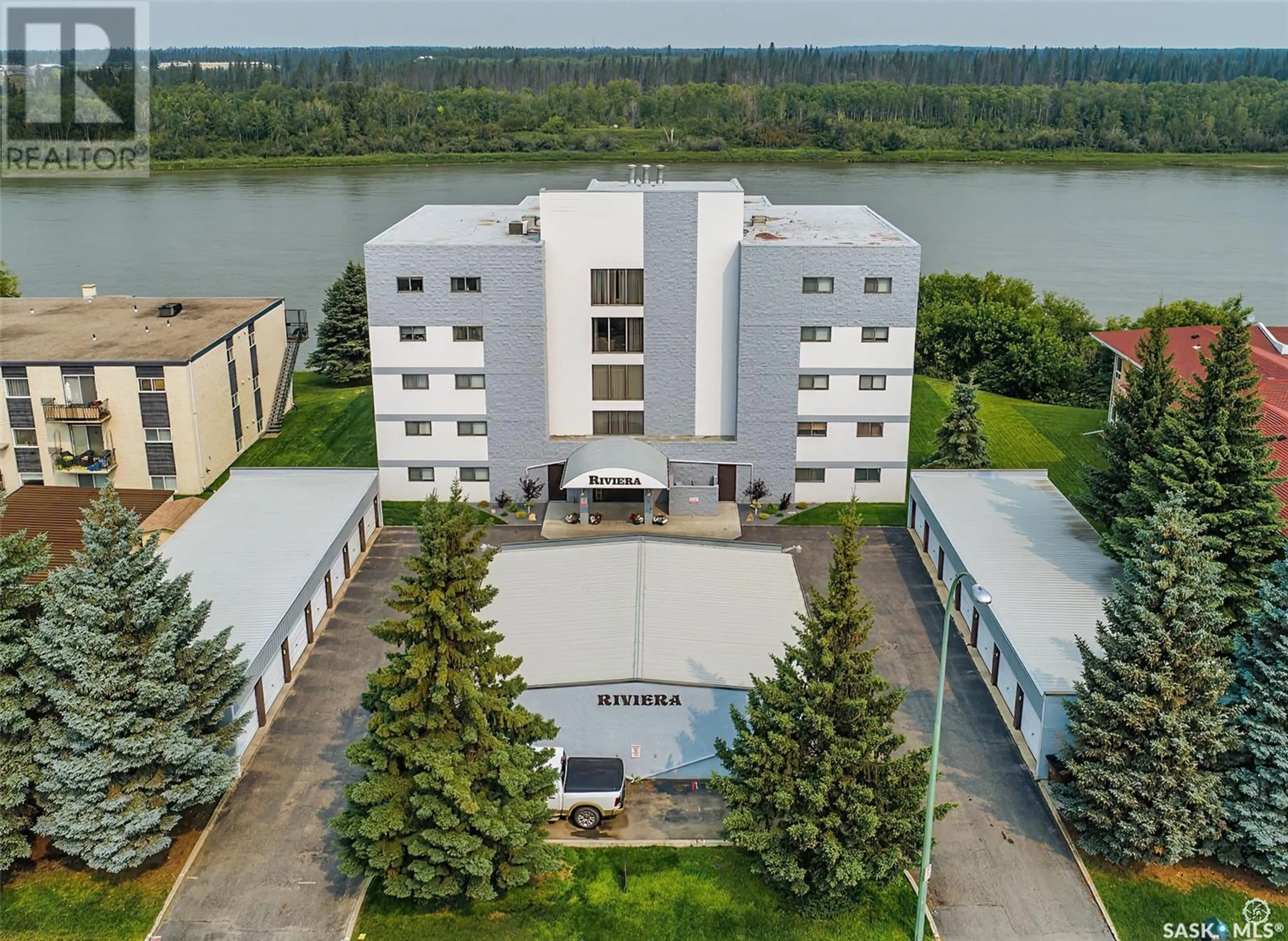 A pic from outside/outdoor area/front of a property/back of a property/a pic from drone, water/lake/river/ocean view for 2A - 516 RIVER STREET, Prince Albert Saskatchewan S6V0A6