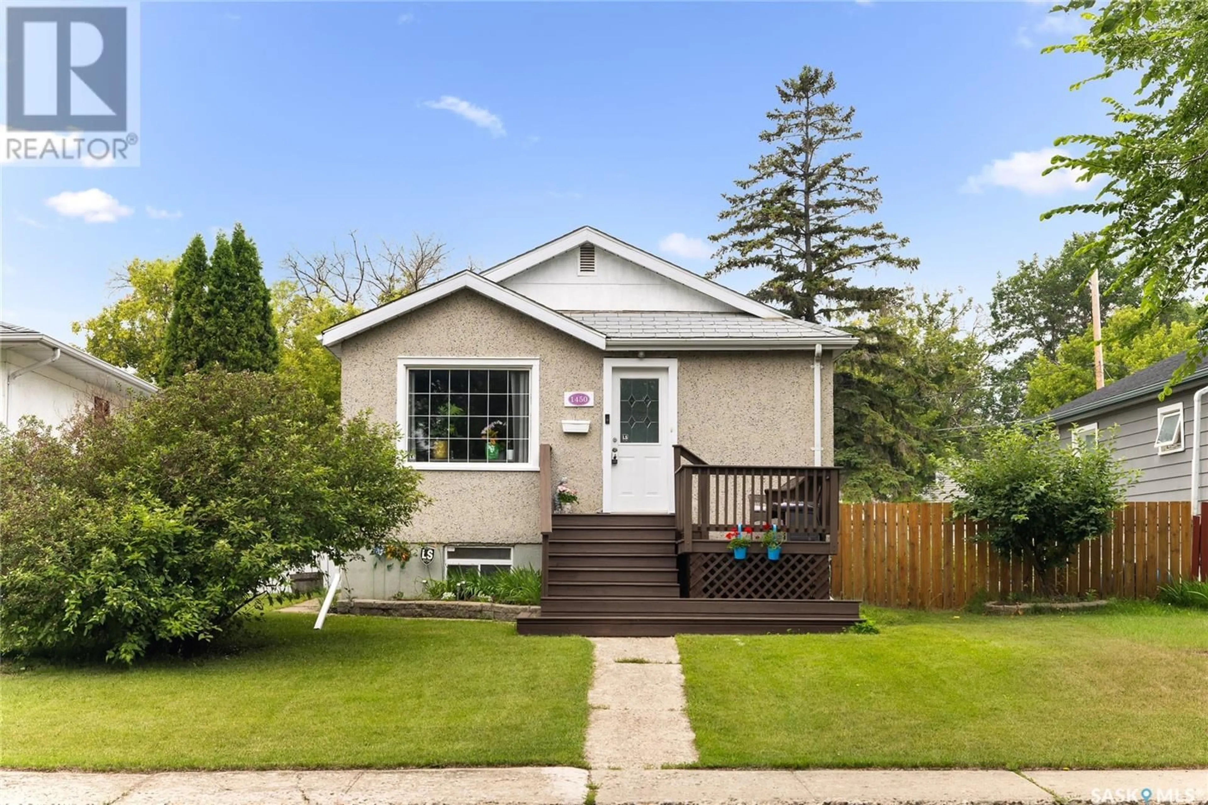 Home with vinyl exterior material, street for 1450 YORK STREET, Regina Saskatchewan S4T4P7