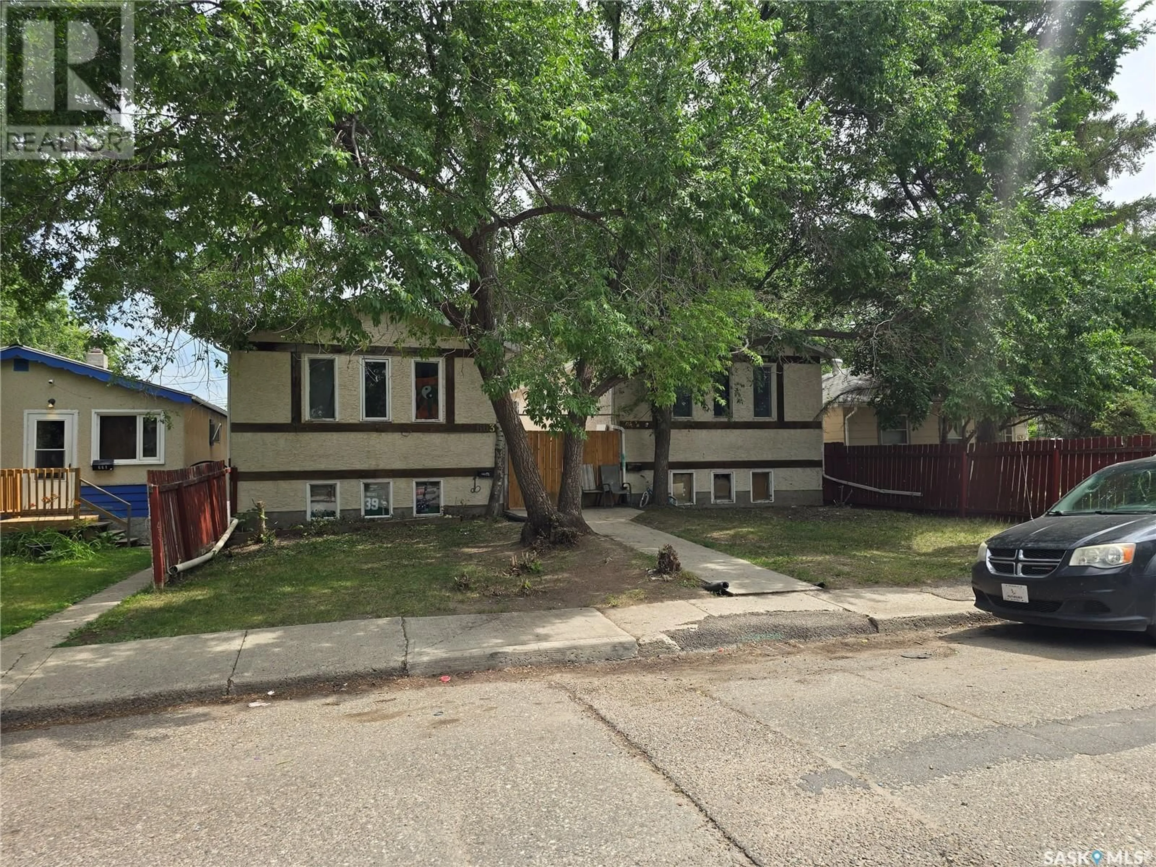 A pic from outside/outdoor area/front of a property/back of a property/a pic from drone, street for 663 ROBINSON STREET, Regina Saskatchewan S4T2L9