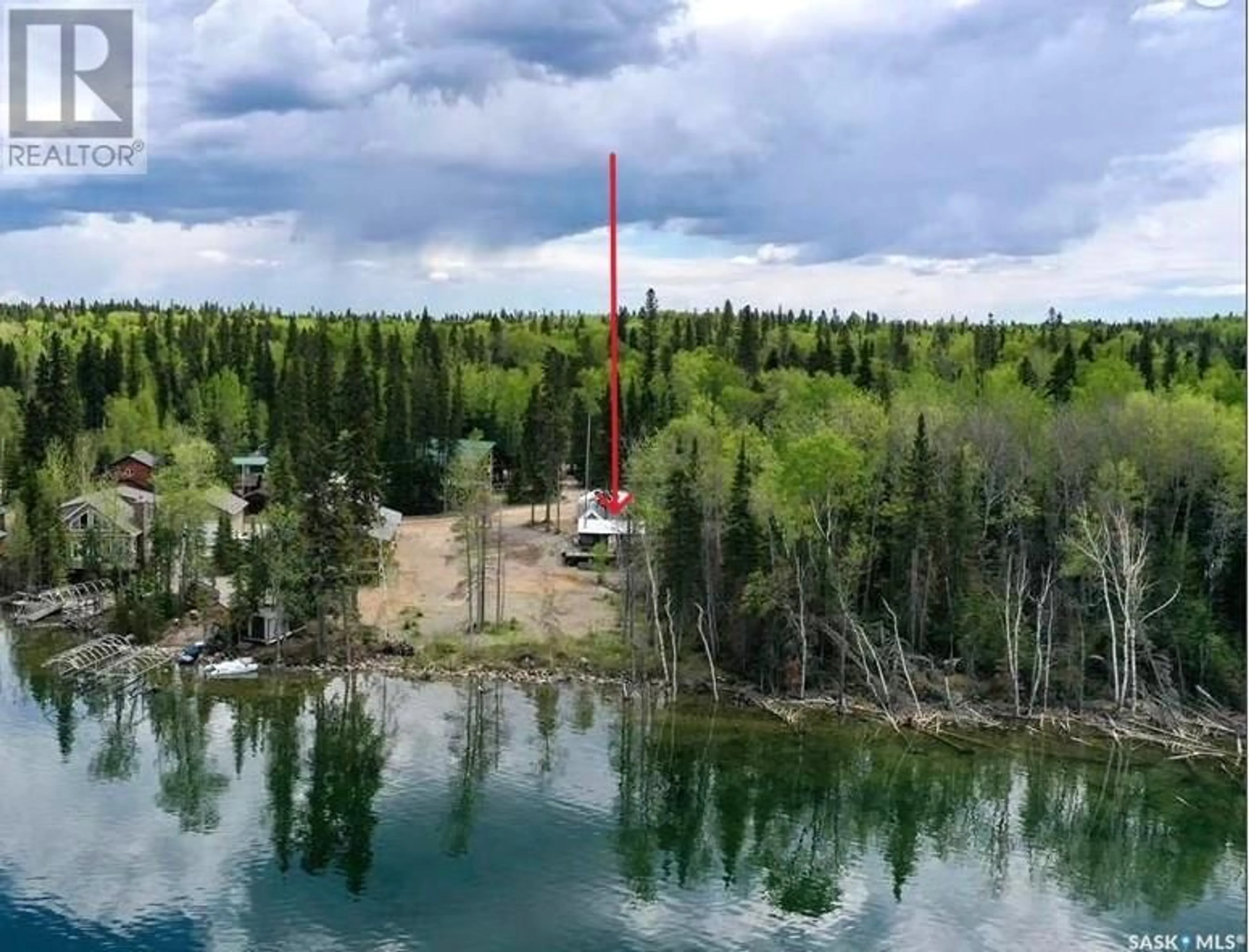 A pic from outside/outdoor area/front of a property/back of a property/a pic from drone, water/lake/river/ocean view for 507 LAKEVIEW AVENUE, Northern Admin District Saskatchewan S0J1L0