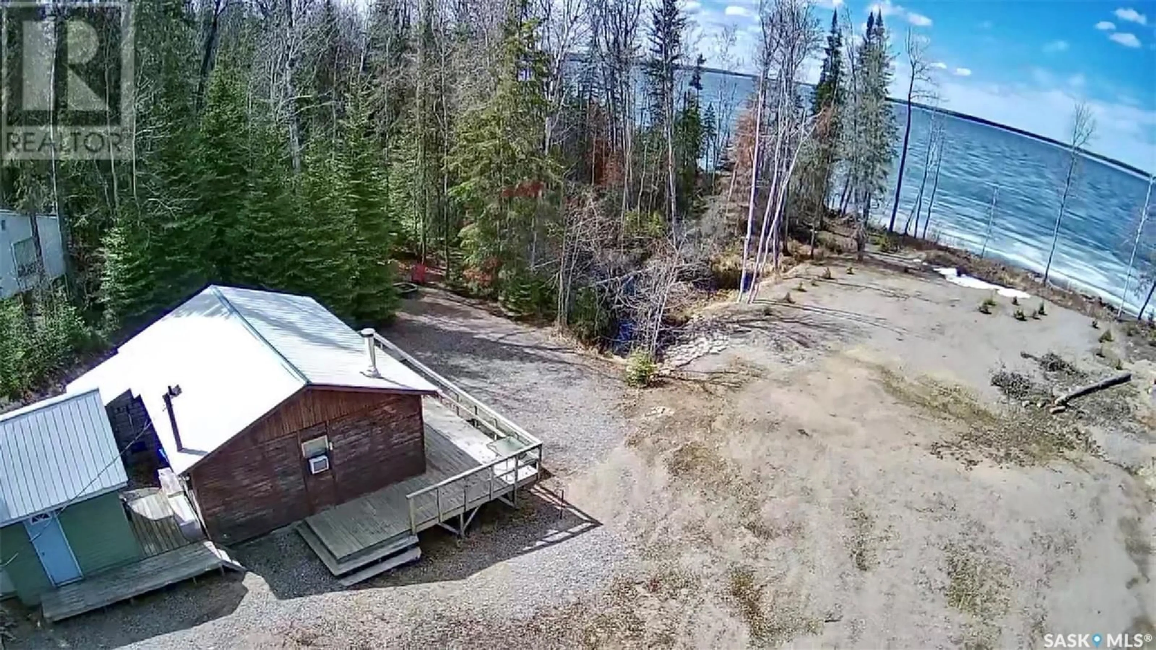 A pic from outside/outdoor area/front of a property/back of a property/a pic from drone, forest/trees view for 507 LAKEVIEW AVENUE, Northern Admin District Saskatchewan S0J1L0