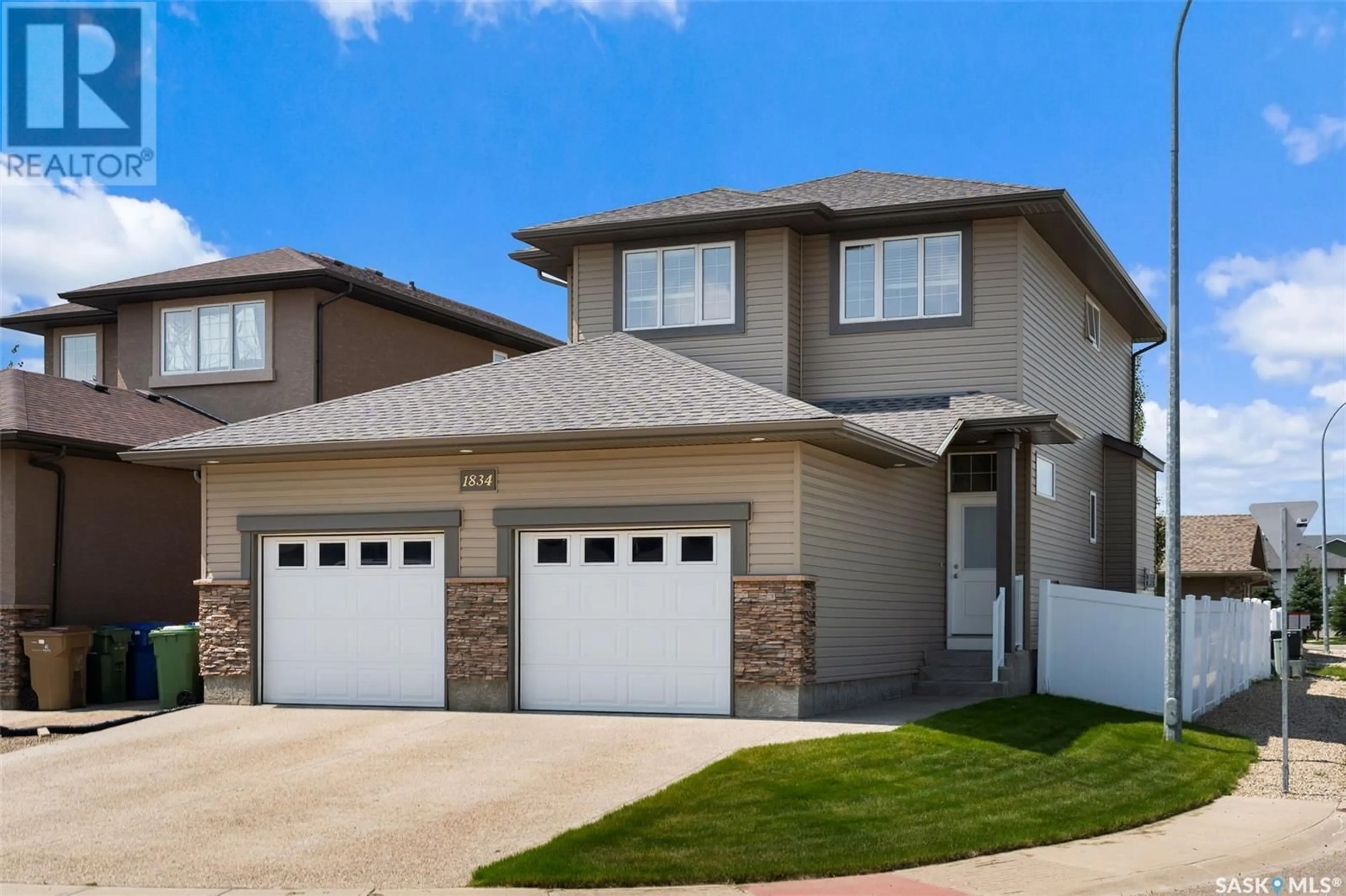 Home with vinyl exterior material, street for 1834 BLAKE ROAD, Regina Saskatchewan S4X0G5