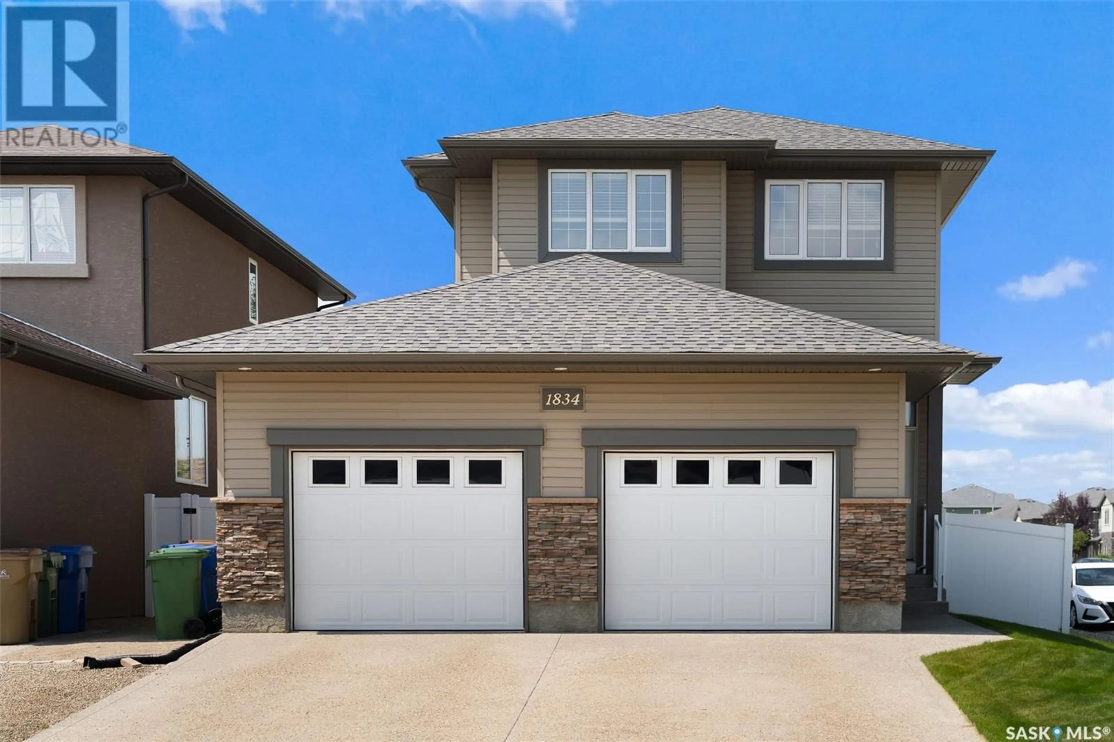 Home with vinyl exterior material, street for 1834 BLAKE ROAD, Regina Saskatchewan S4X0G5