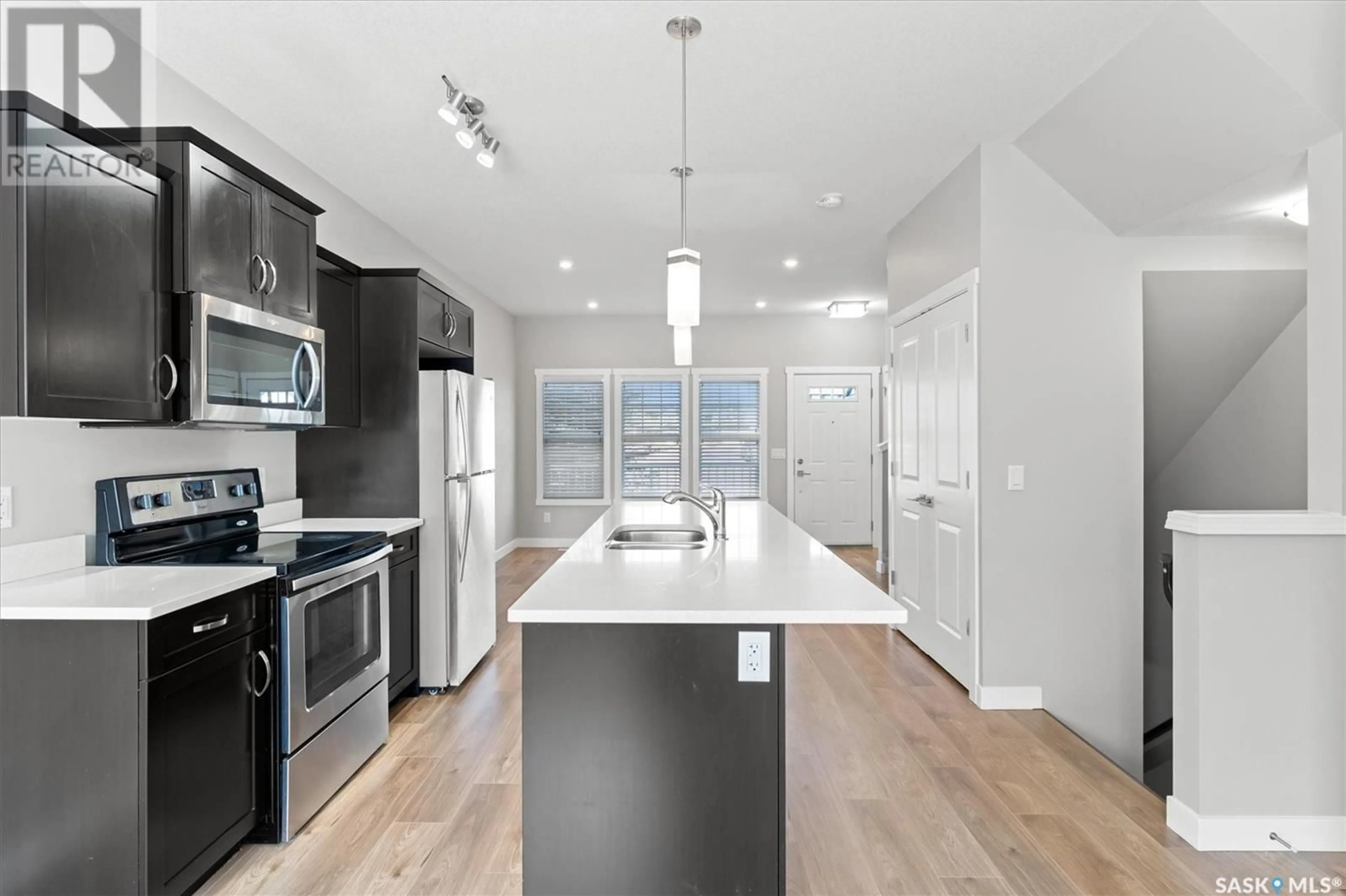 Open concept kitchen, unknown for 1202 PRINGLE WAY, Saskatoon Saskatchewan S7T0X5