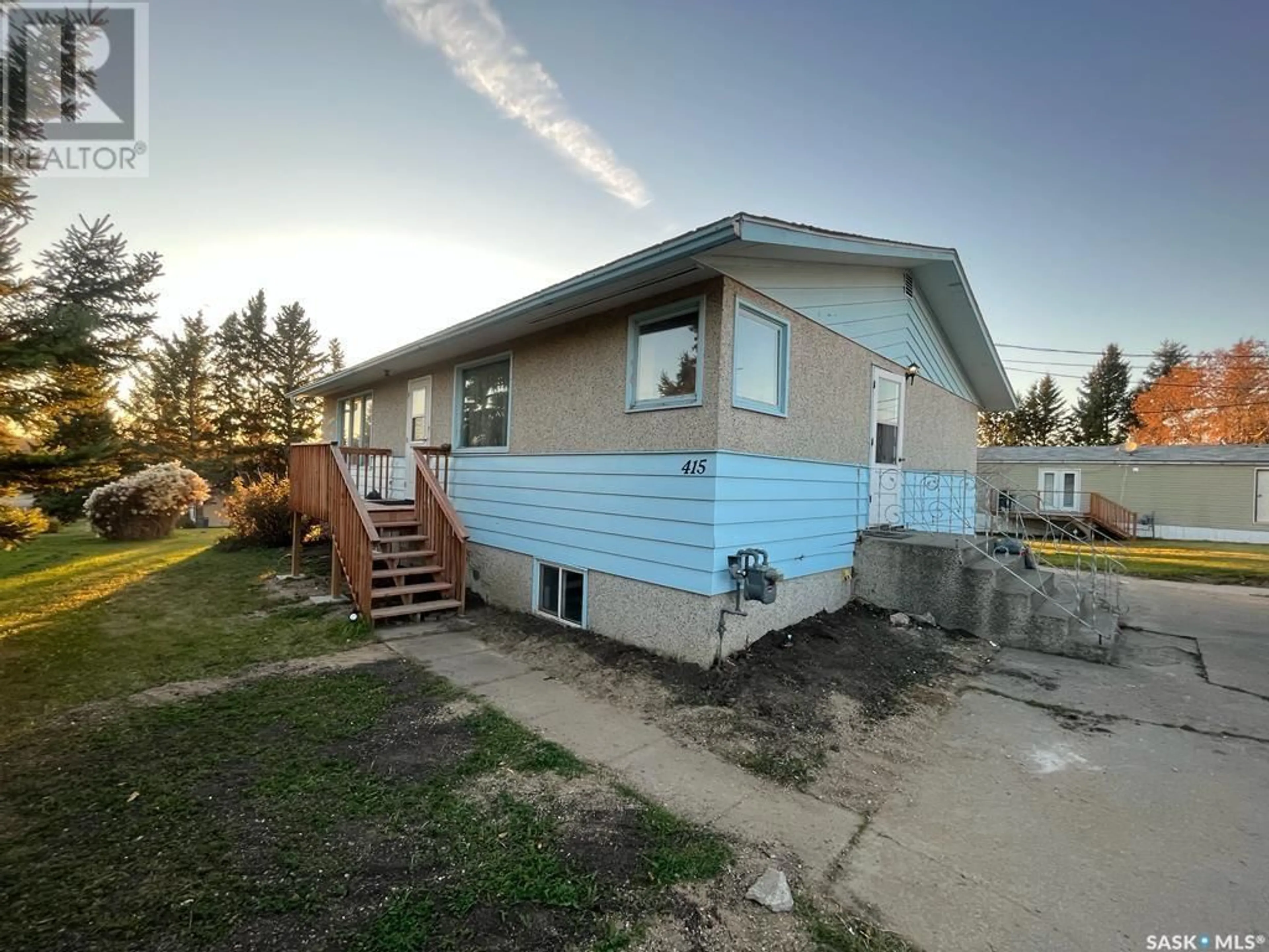Home with vinyl exterior material, street for 415 1ST AVENUE, Turtleford Saskatchewan S0M2Y0