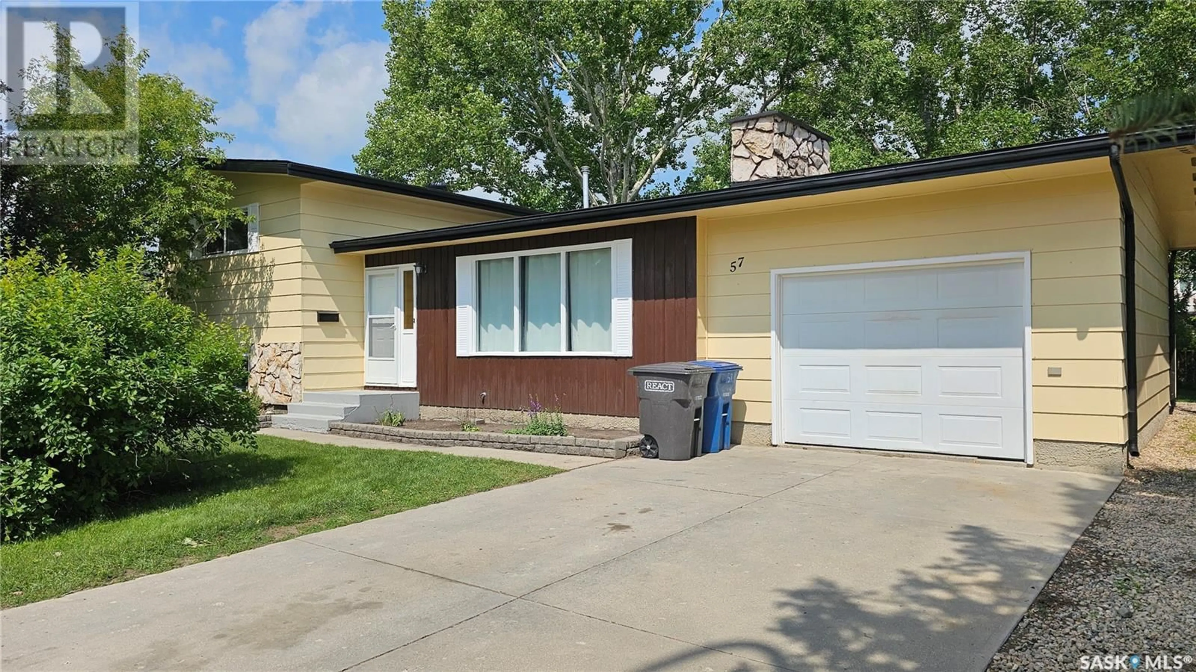 Home with vinyl exterior material, street for 57 JUBILEE DRIVE, Humboldt Saskatchewan S0K2A0