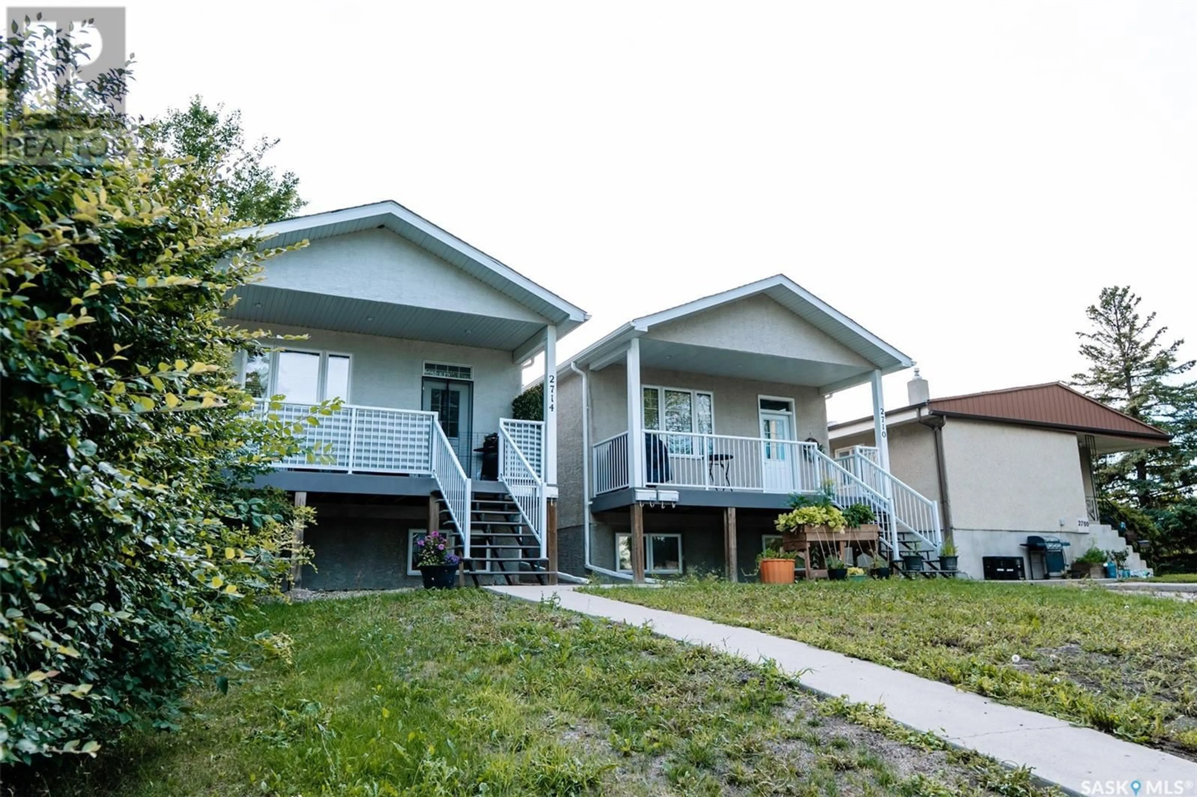 Home with vinyl exterior material, street for 2710 FRANCIS STREET, Regina Saskatchewan S4N2R3