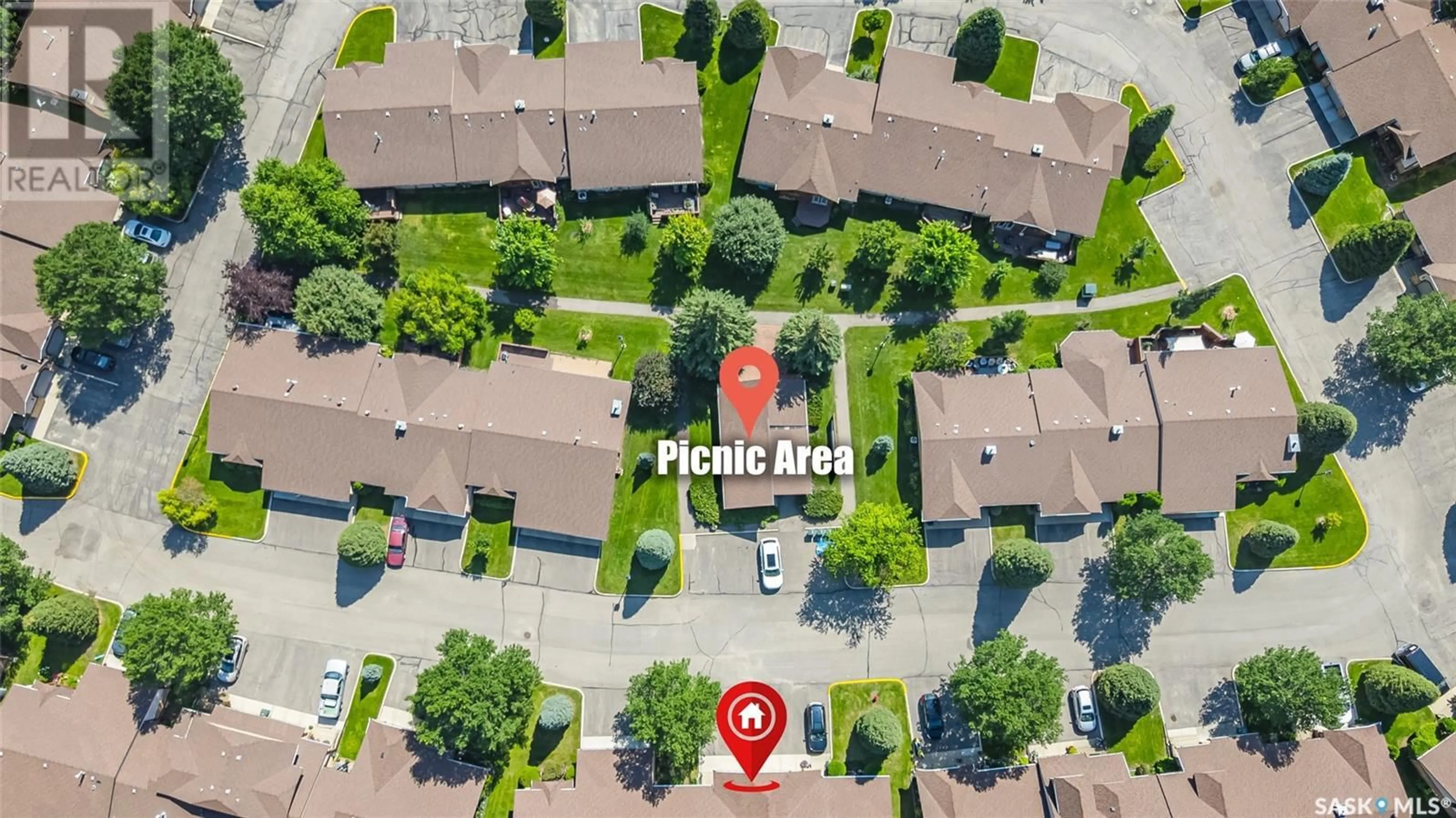 A pic from outside/outdoor area/front of a property/back of a property/a pic from drone, street for 30 - 310 KINGSMERE BOULEVARD, Saskatoon Saskatchewan S7J4S4