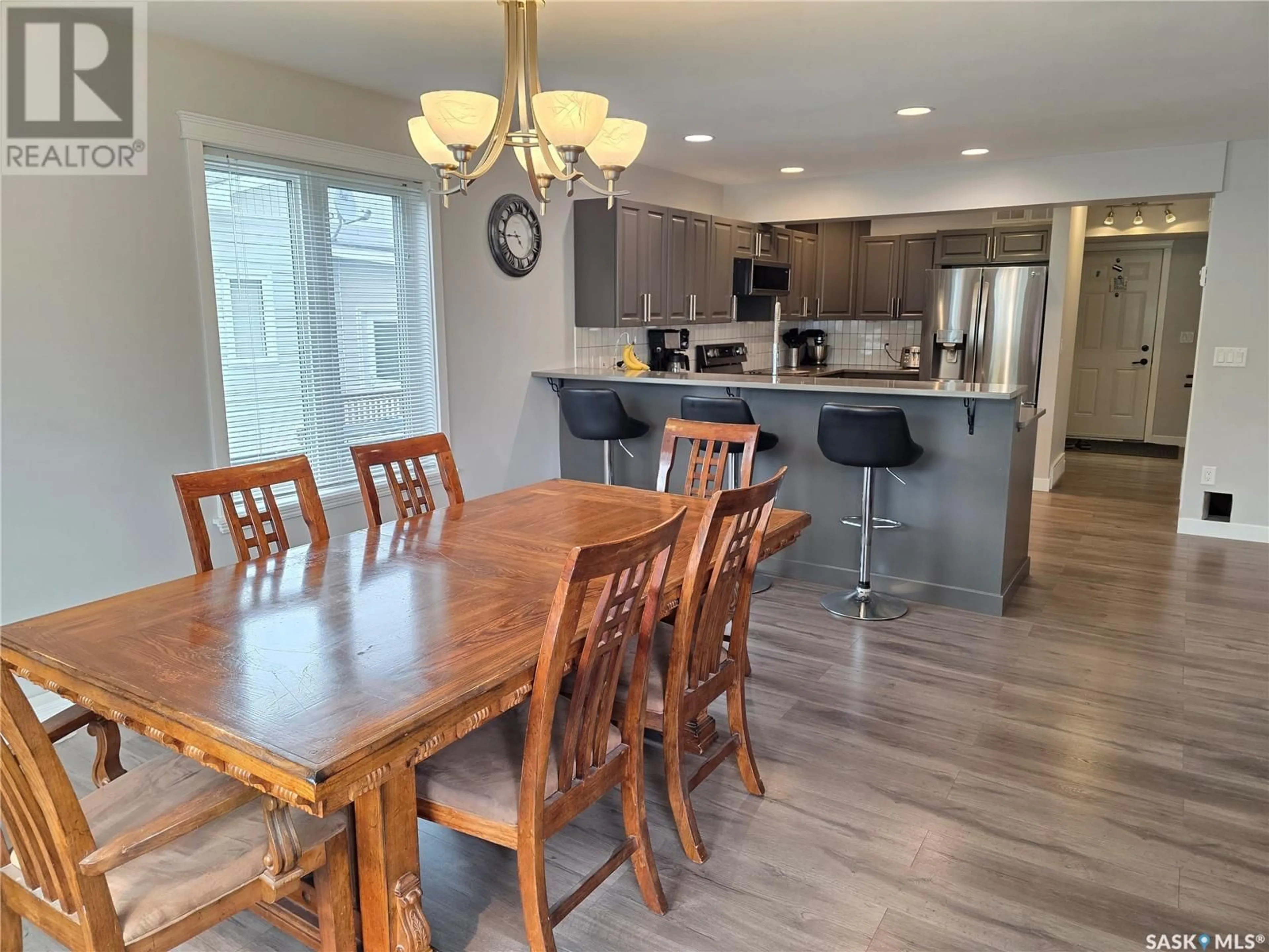 Open concept kitchen, wood/laminate floor for 328 MCTAVISH STREET, Outlook Saskatchewan S0L2N0