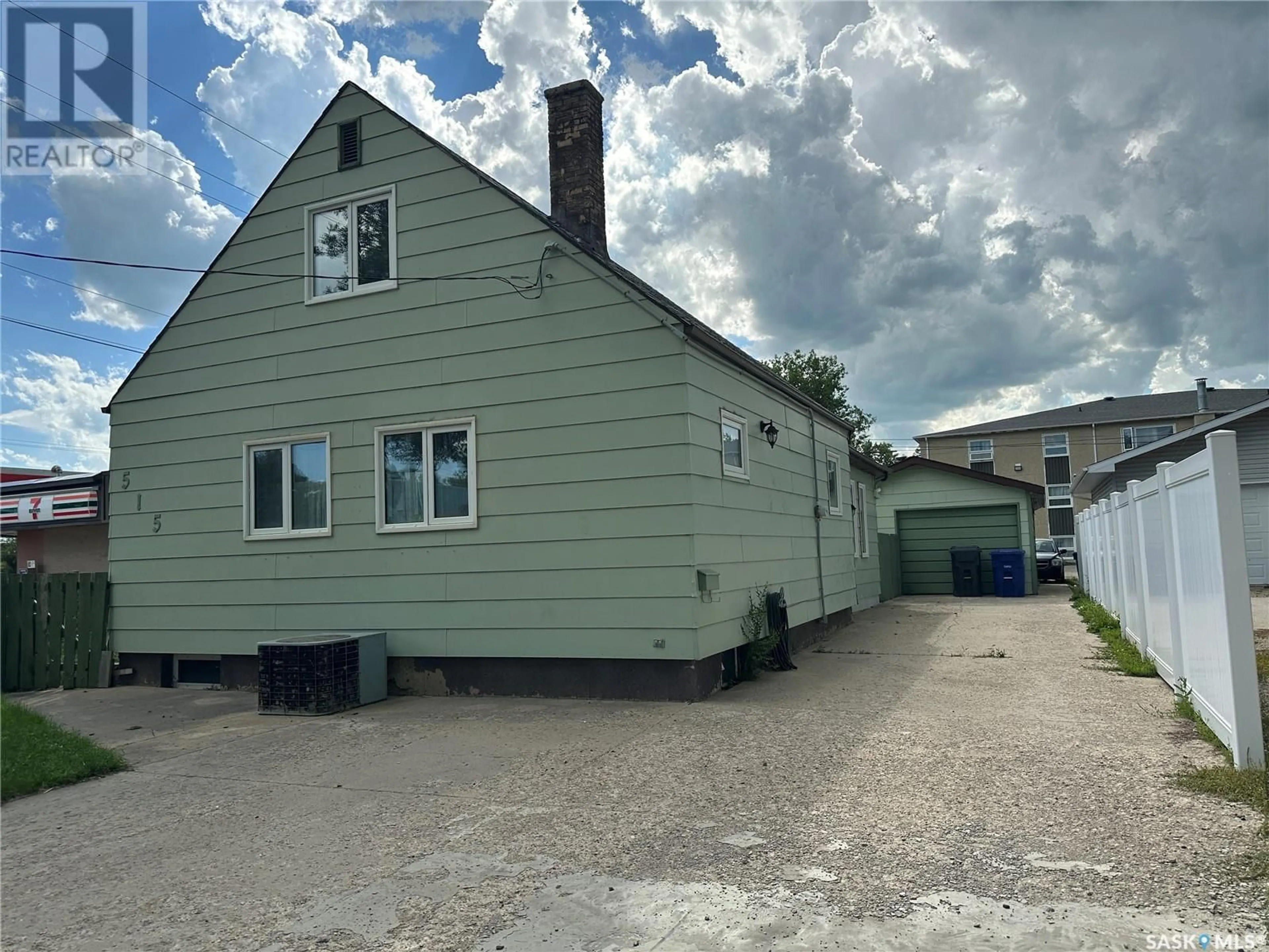 A pic from outside/outdoor area/front of a property/back of a property/a pic from drone, street for 515 KING STREET, Weyburn Saskatchewan S4H0P8