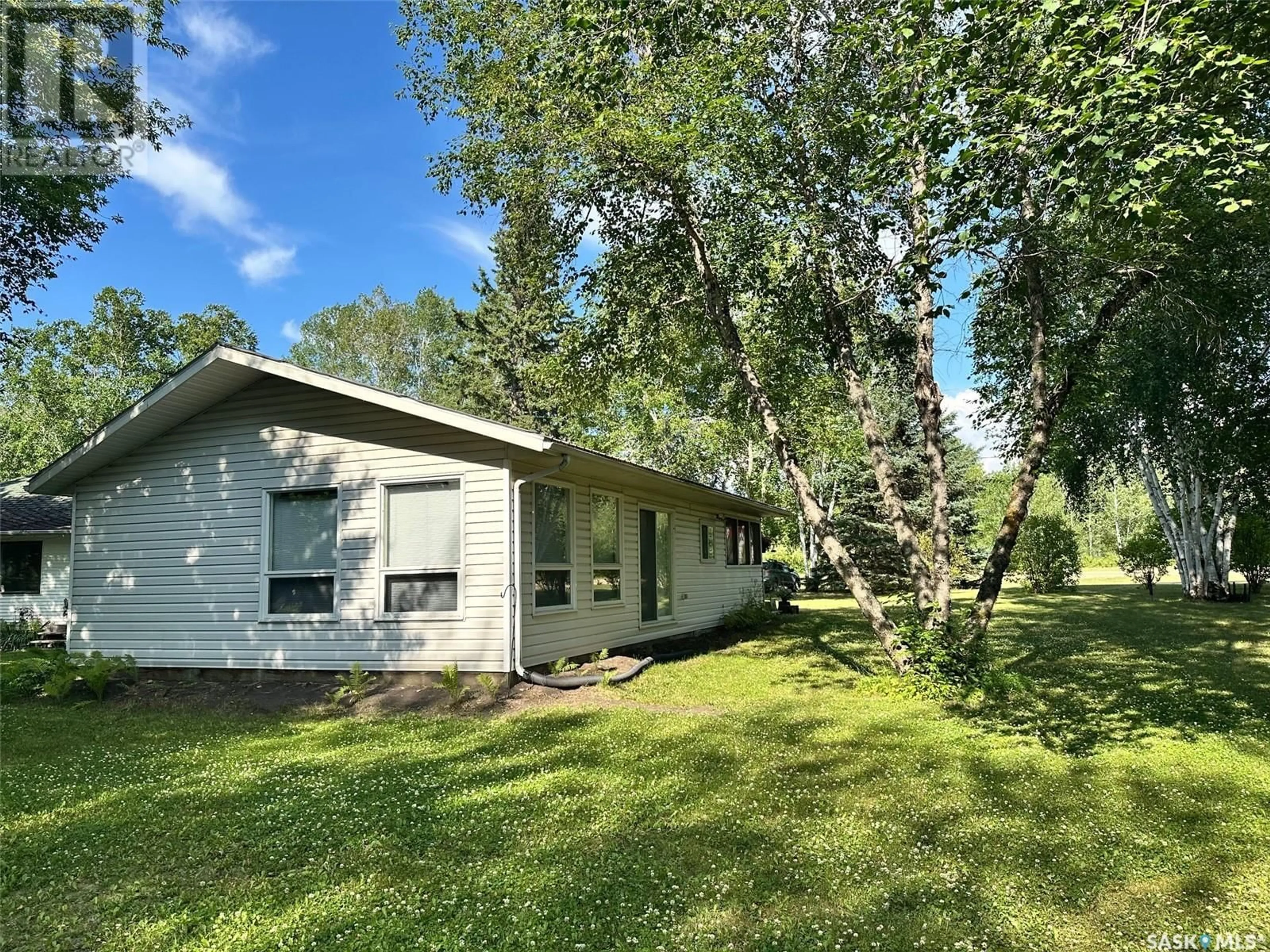 A pic from outside/outdoor area/front of a property/back of a property/a pic from drone, unknown for 24 RUBY CRESCENT, Hudson Bay Saskatchewan S0E0E0
