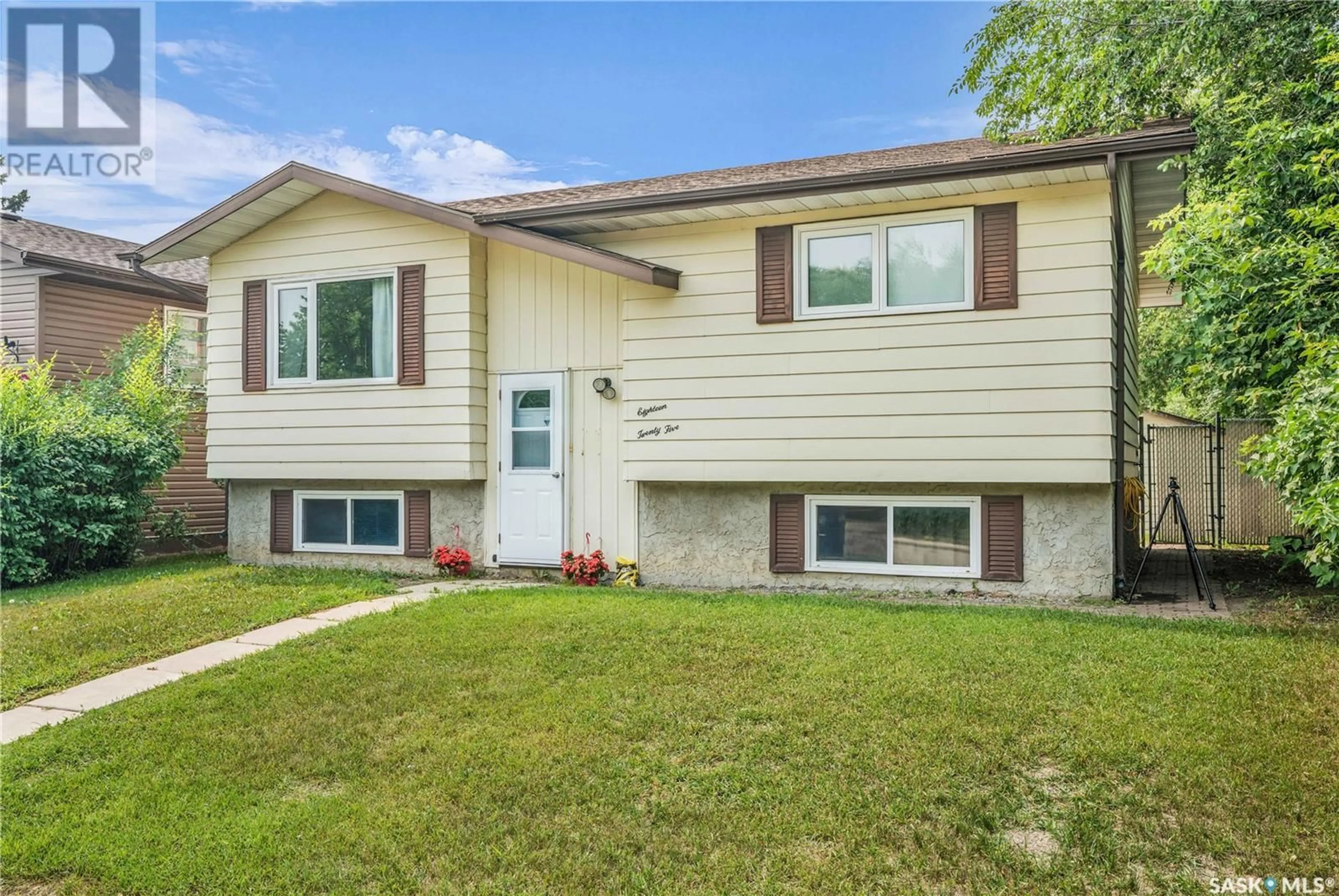 Home with vinyl exterior material, street for 1825 17TH AVENUE, Prince Albert Saskatchewan S6V6Y9