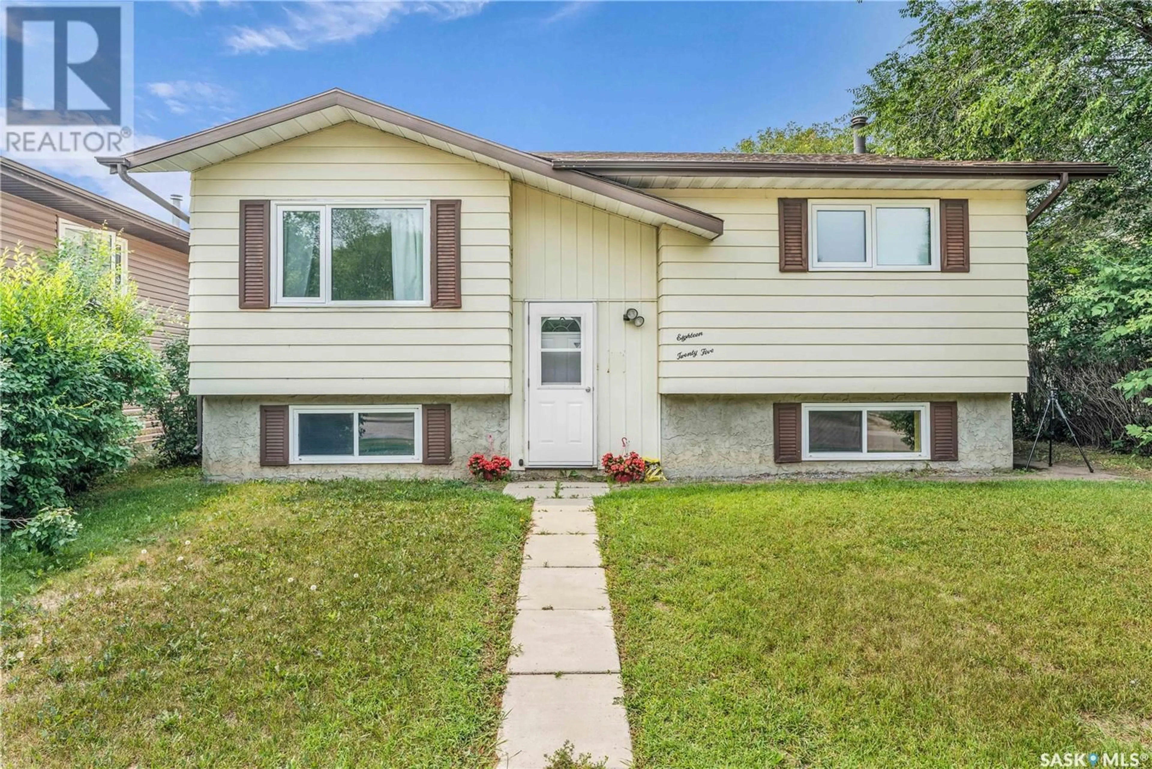 Home with vinyl exterior material, street for 1825 17TH AVENUE, Prince Albert Saskatchewan S6V6Y9