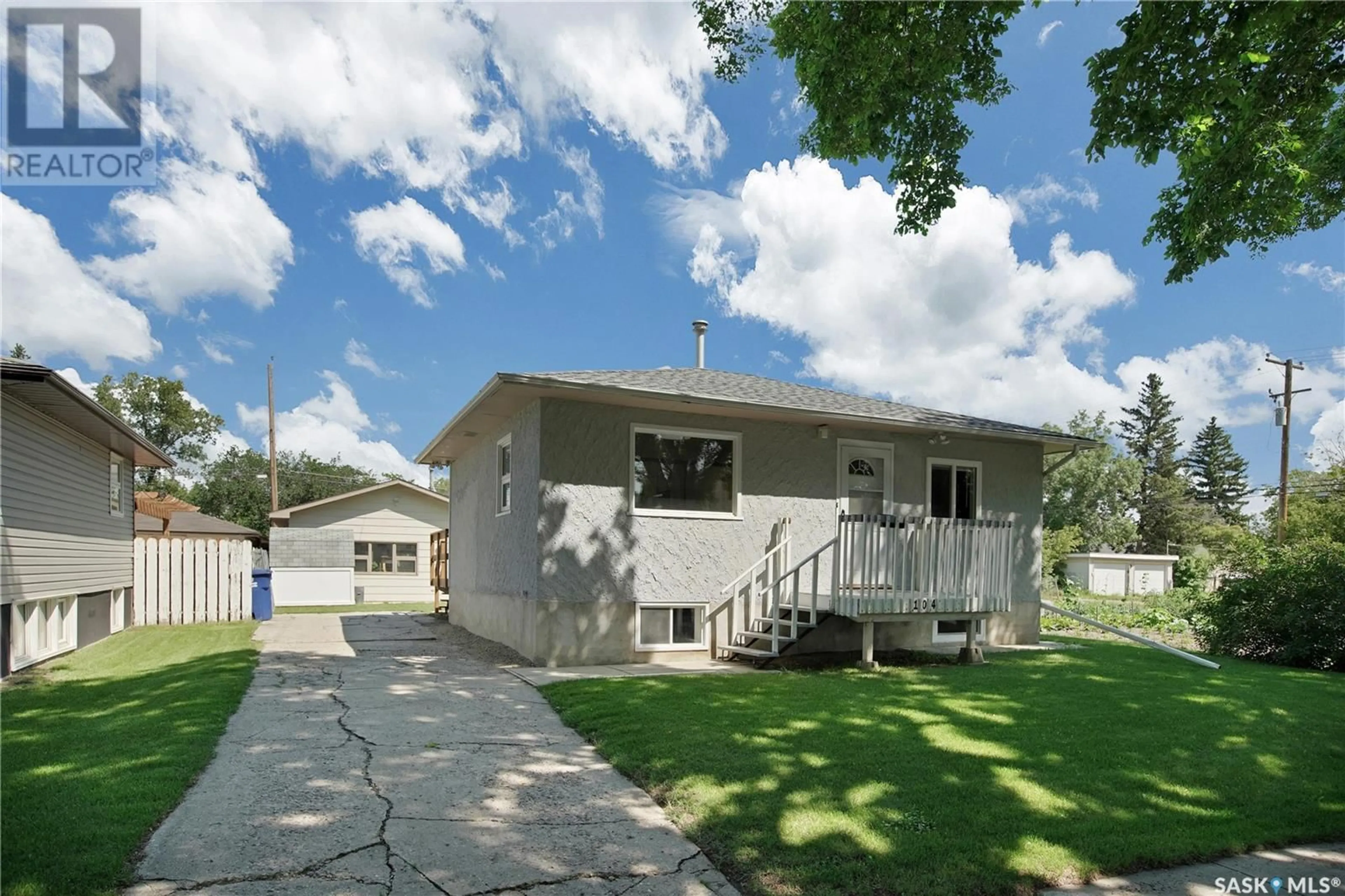 Home with vinyl exterior material, street for 104 106TH STREET, Saskatoon Saskatchewan S7N1N5