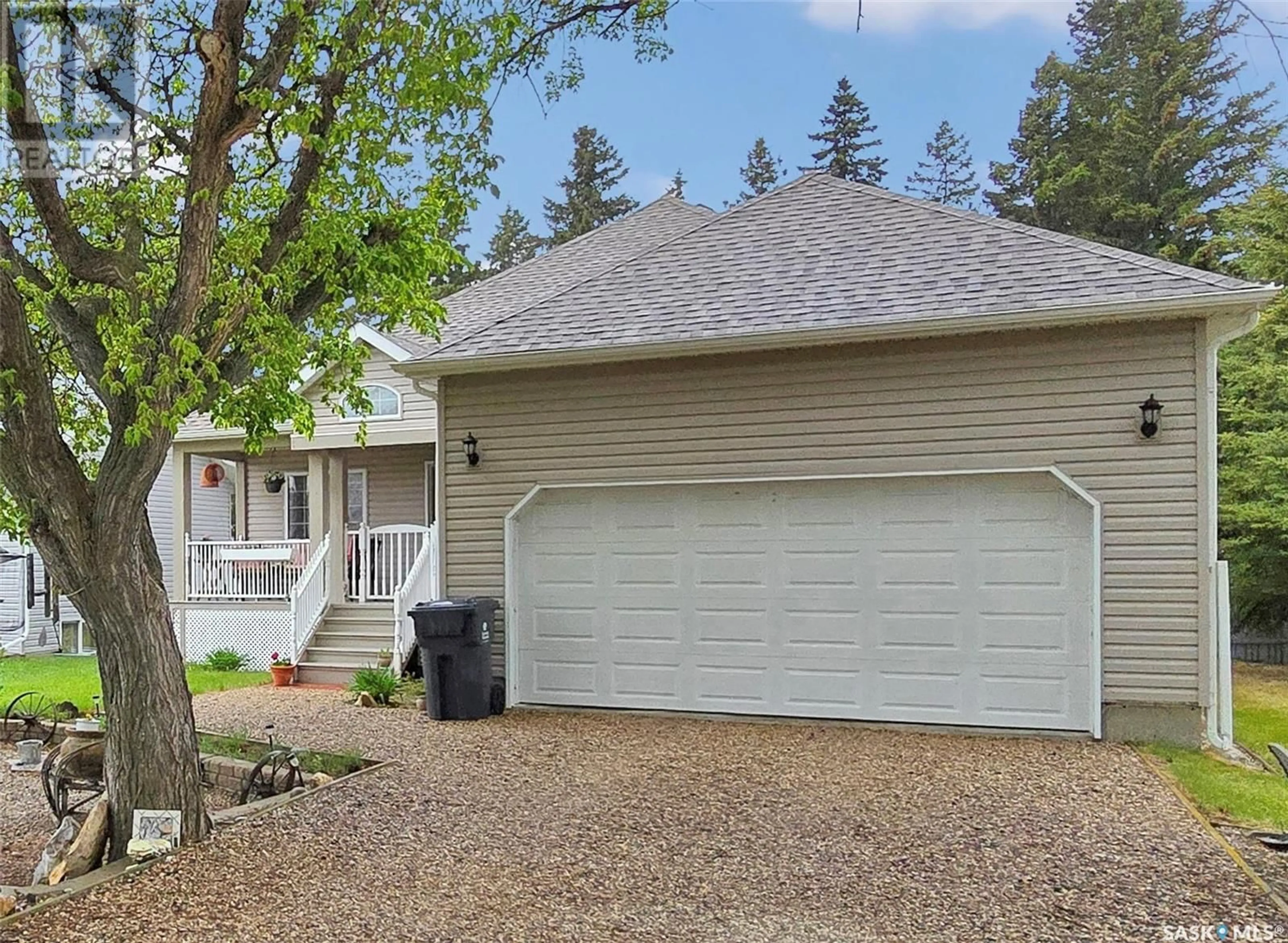 Home with vinyl exterior material, street for 5001 CENTRAL AVENUE, Waldheim Saskatchewan S0K4R0