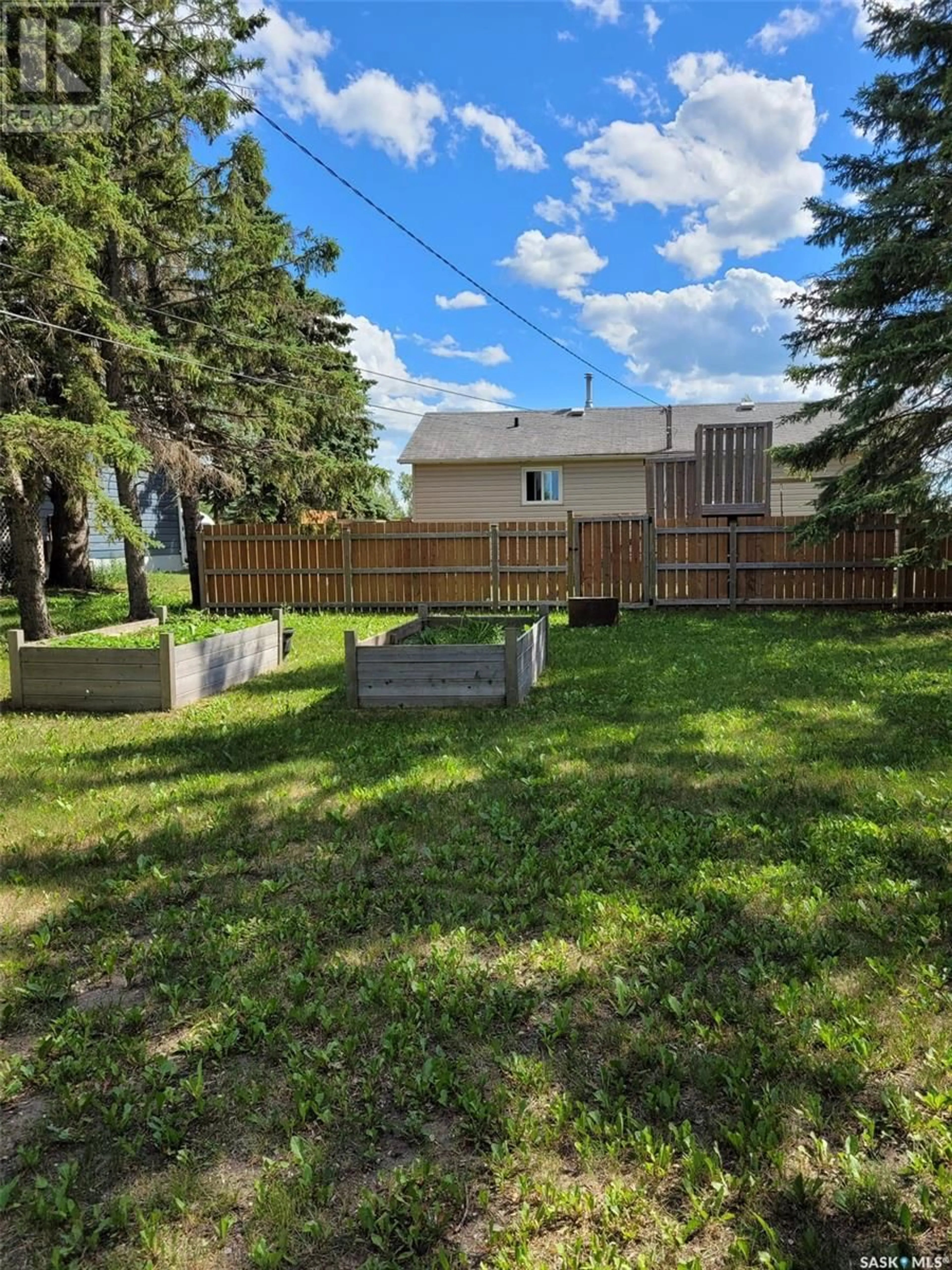 A pic from outside/outdoor area/front of a property/back of a property/a pic from drone, unknown for 414 4TH STREET, Wakaw Saskatchewan S0K4P0