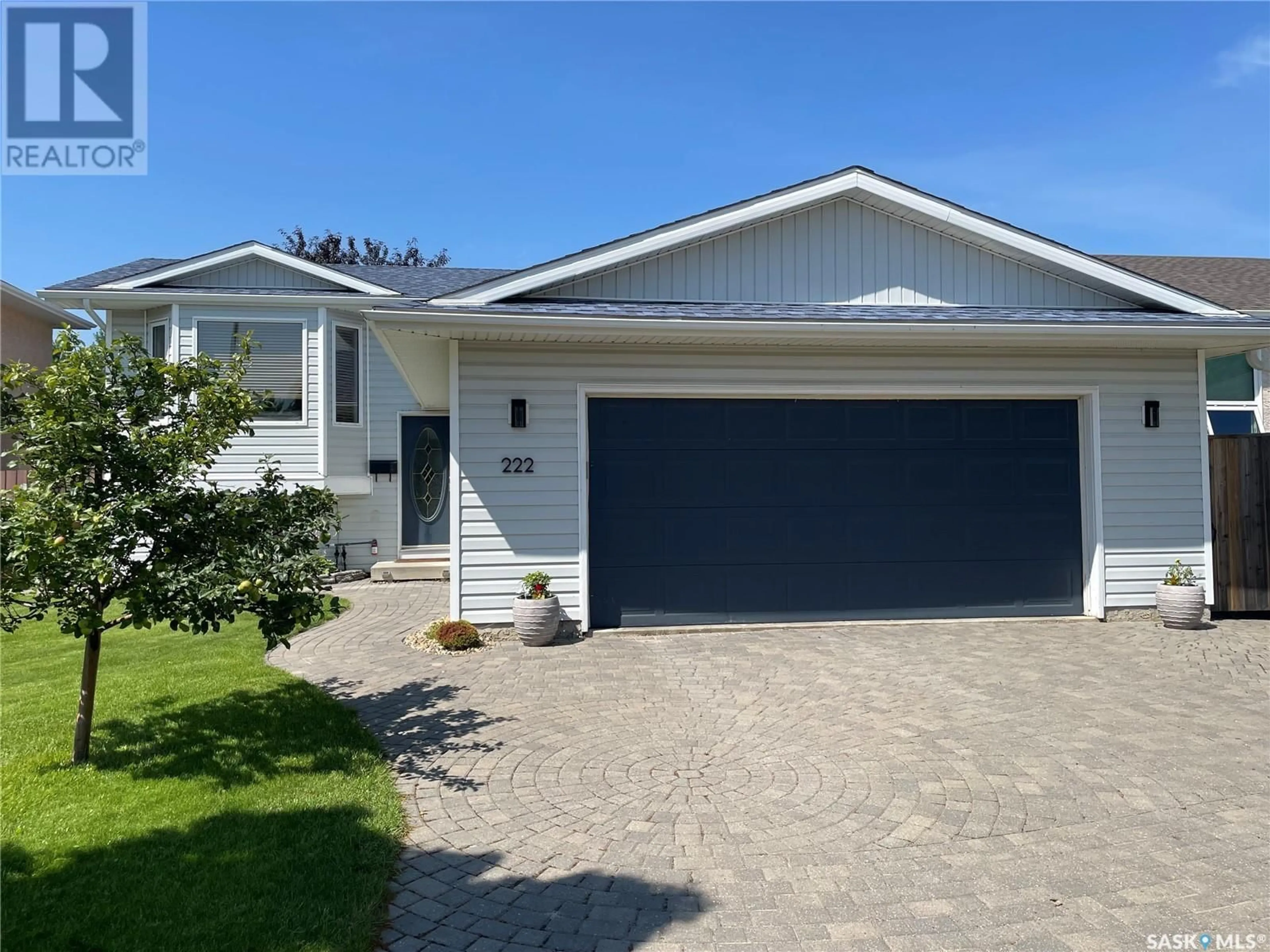 Home with vinyl exterior material, street for 222 BEERLING CRESCENT, Saskatoon Saskatchewan S7S1K4