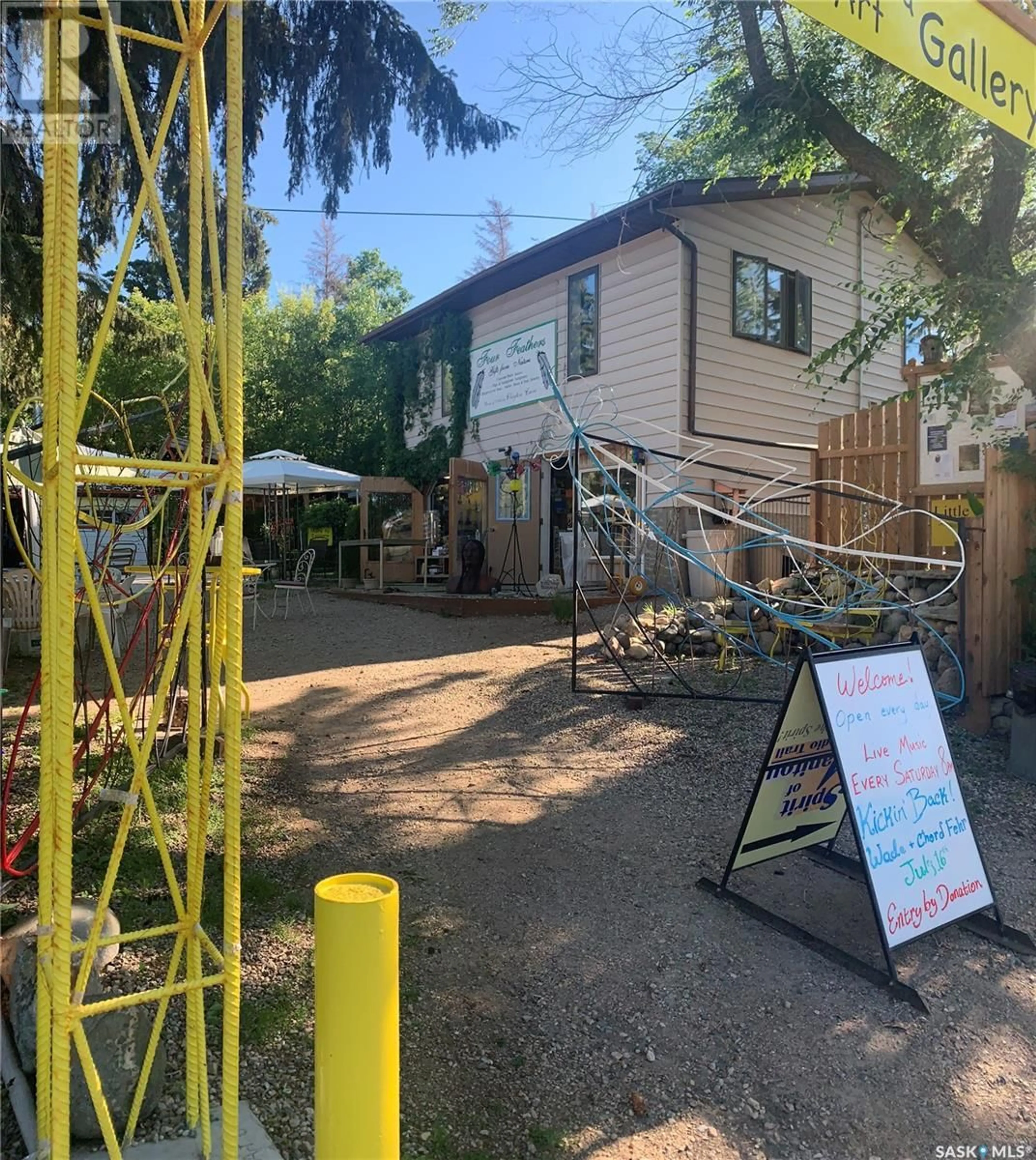 A pic from outside/outdoor area/front of a property/back of a property/a pic from drone, street for 202-206 ELIZABETH AVENUE, Manitou Beach Saskatchewan S0K4T1