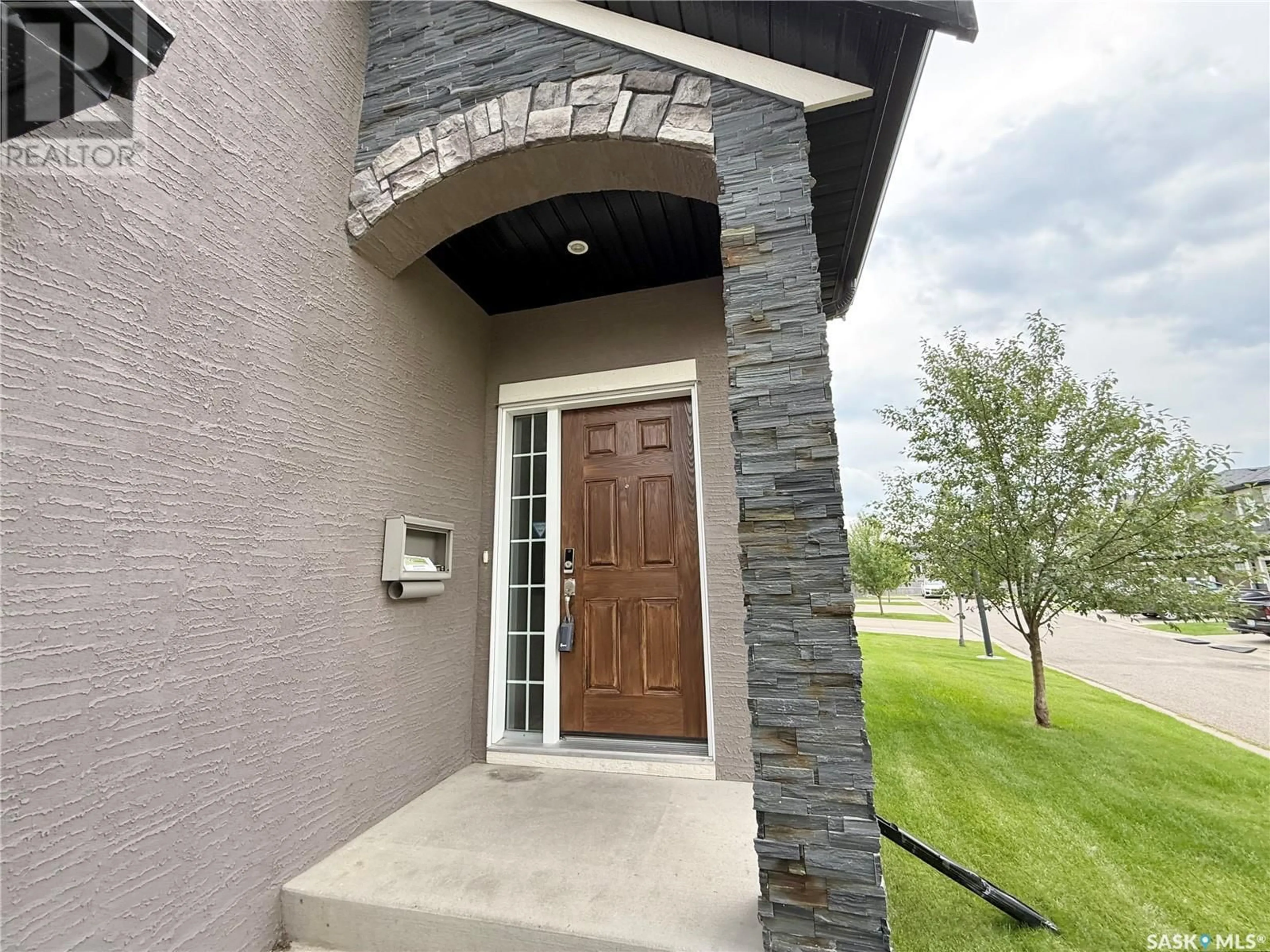 Home with brick exterior material, street for 306 - 1303 PATON CRESCENT, Saskatoon Saskatchewan S7W0P6