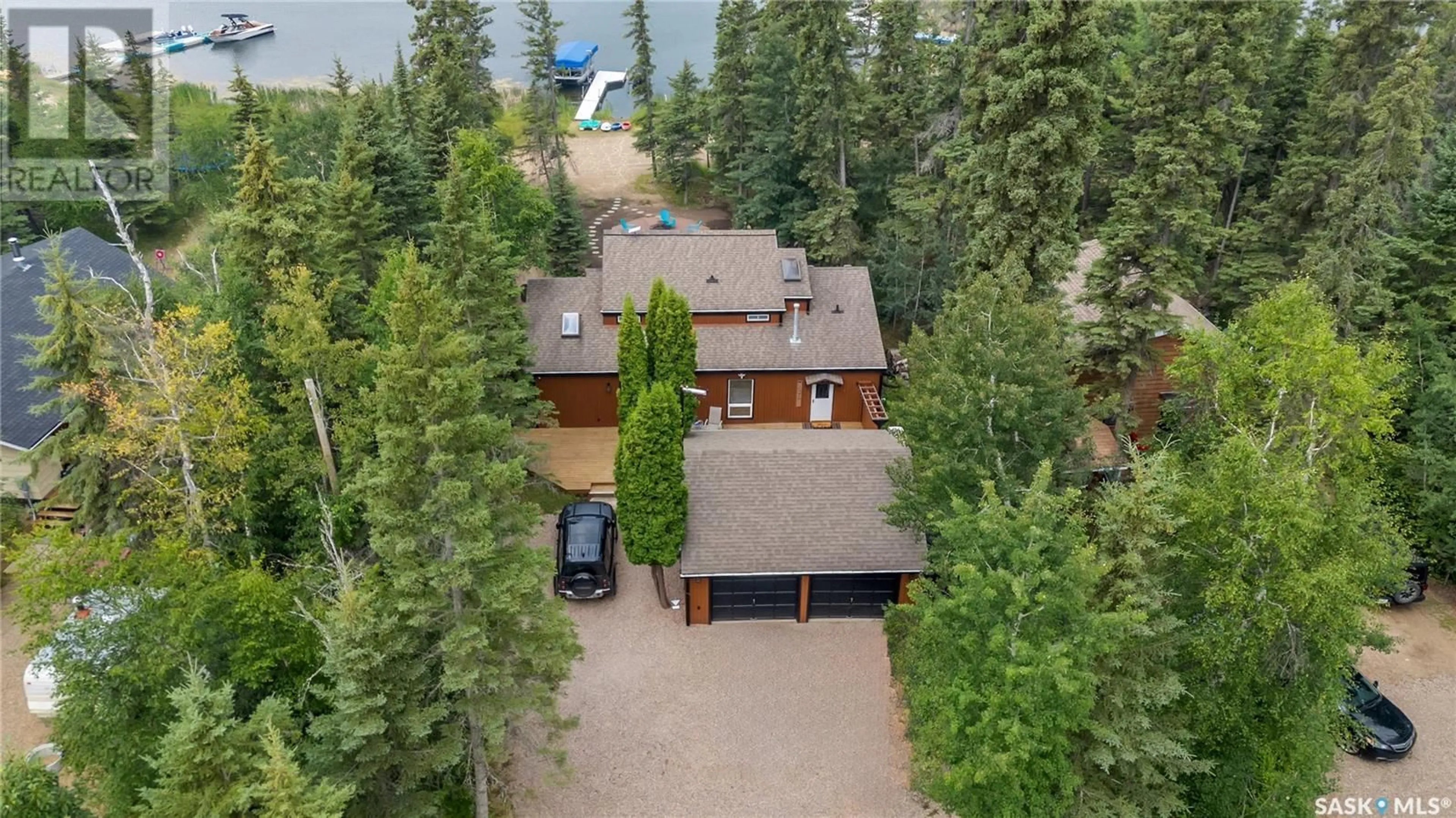 A pic from outside/outdoor area/front of a property/back of a property/a pic from drone, unknown for 712 MARINE DRIVE, Lakeland Rm No. 521 Saskatchewan S0J0N0