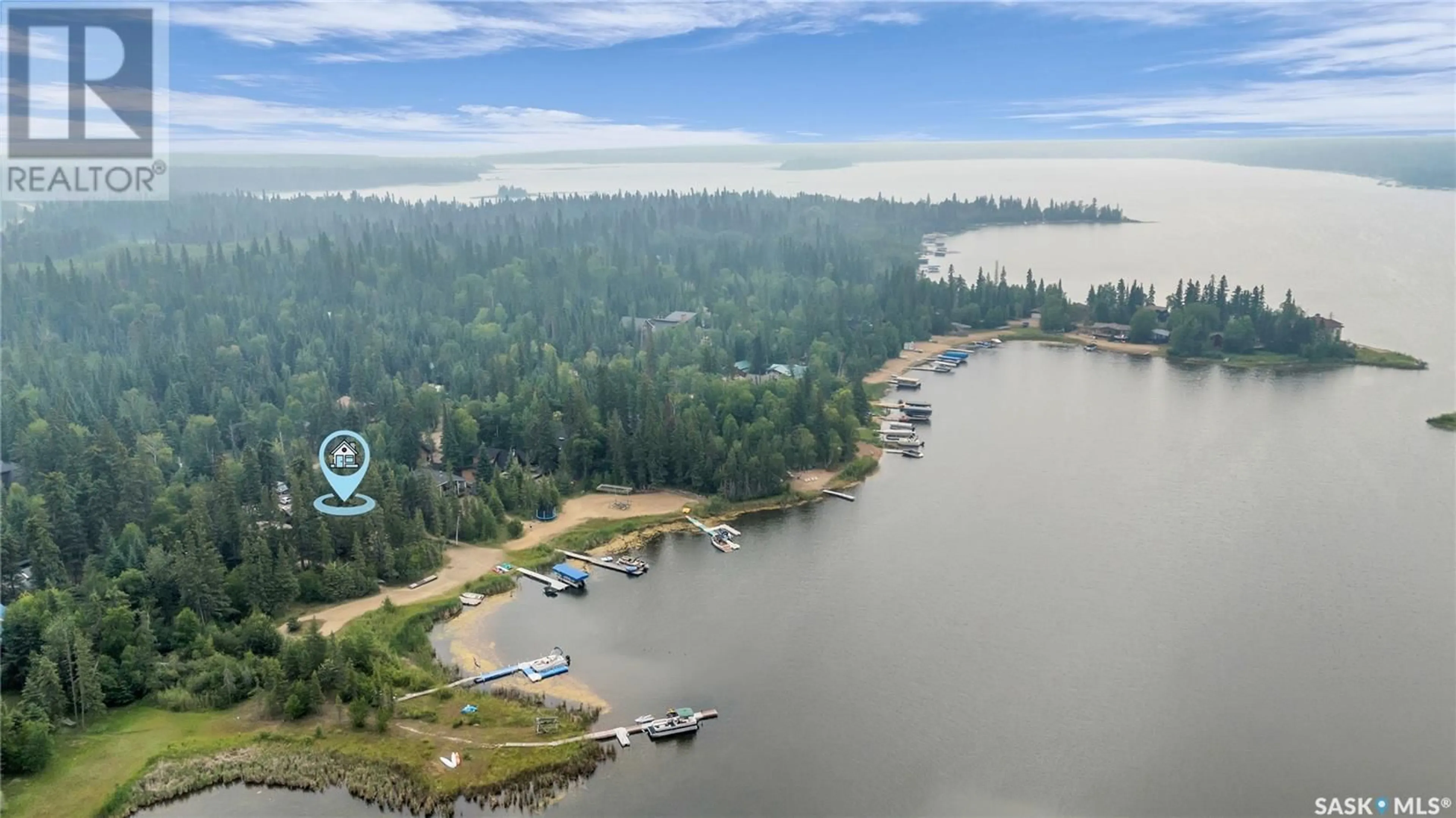 A pic from outside/outdoor area/front of a property/back of a property/a pic from drone, water/lake/river/ocean view for 712 MARINE DRIVE, Lakeland Rm No. 521 Saskatchewan S0J0N0