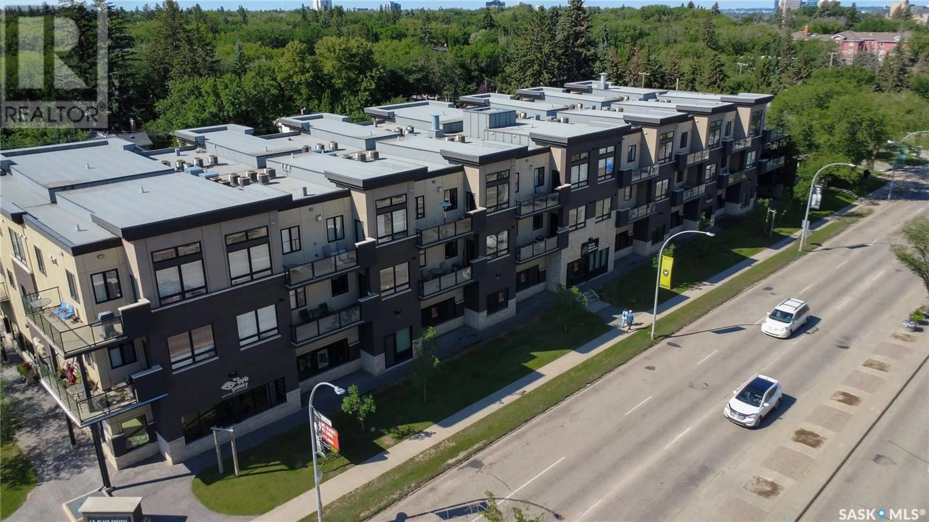 A pic from outside/outdoor area/front of a property/back of a property/a pic from drone, street for 204 - 1132 COLLEGE DRIVE, Saskatoon Saskatchewan S7N0W2