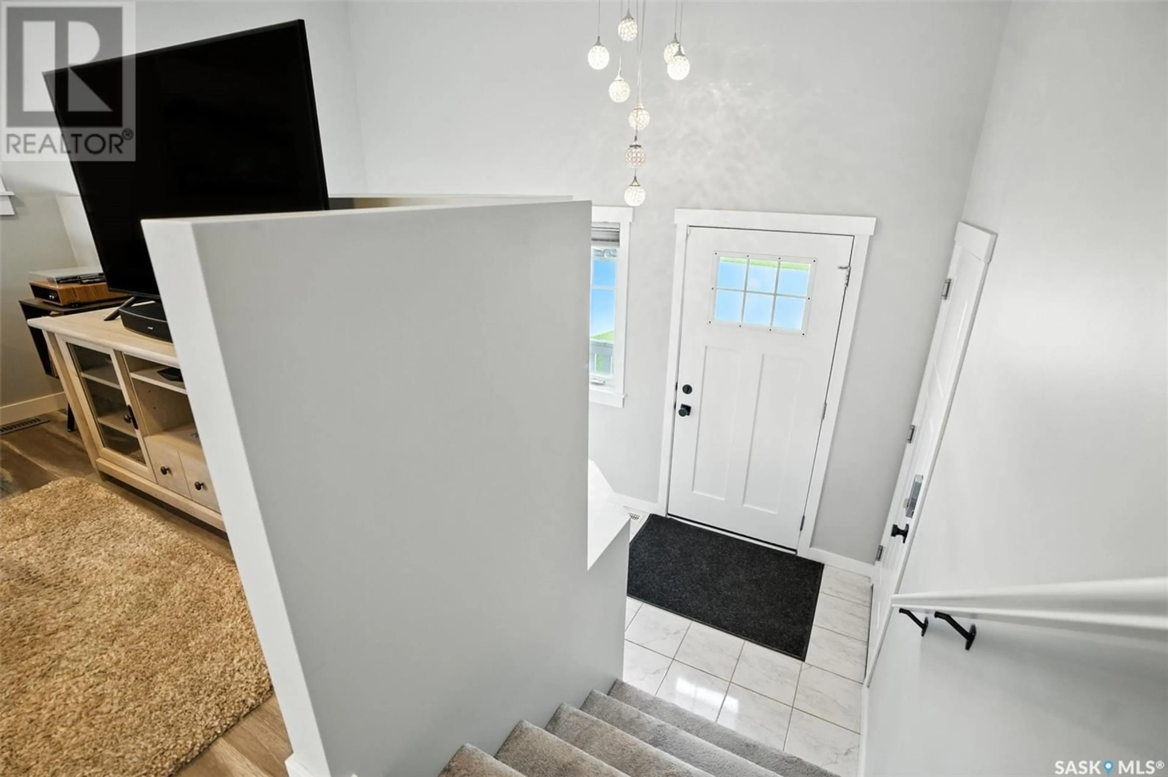 Indoor entryway for 215 BOLSTAD MANOR, Saskatoon Saskatchewan S7W0Y1