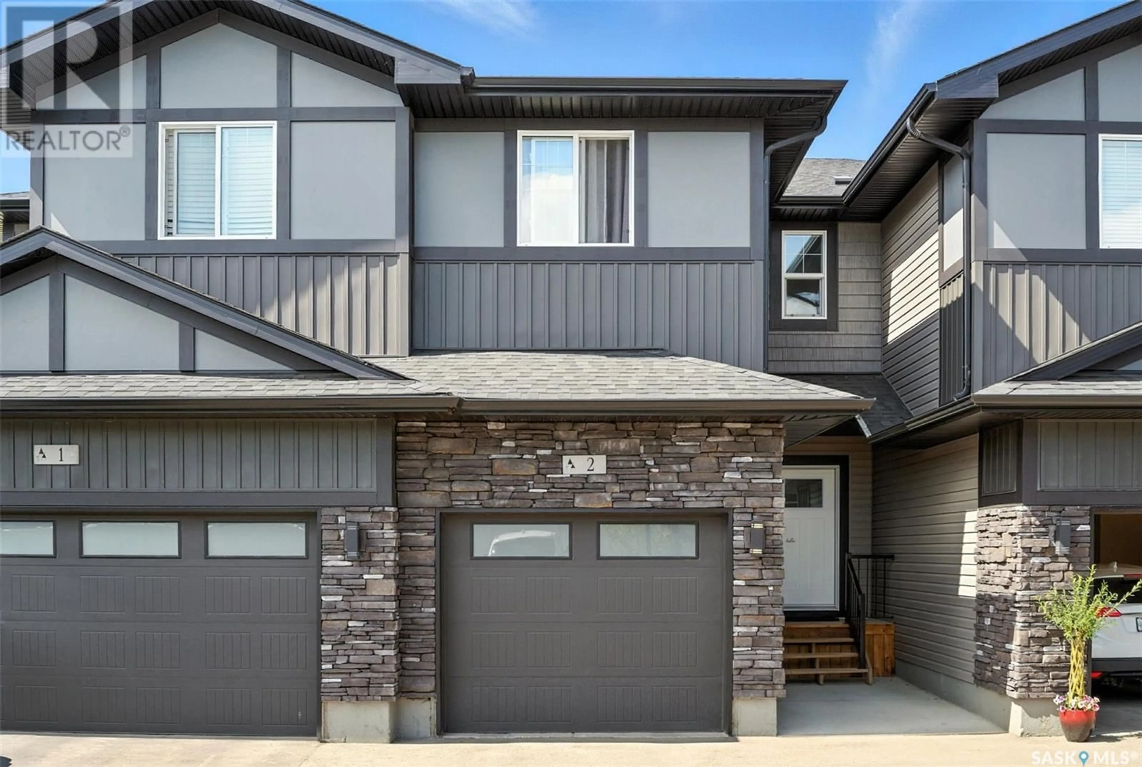 Home with vinyl exterior material, street for 525 - 2 MAHABIR LANE, Saskatoon Saskatchewan S7W1G1