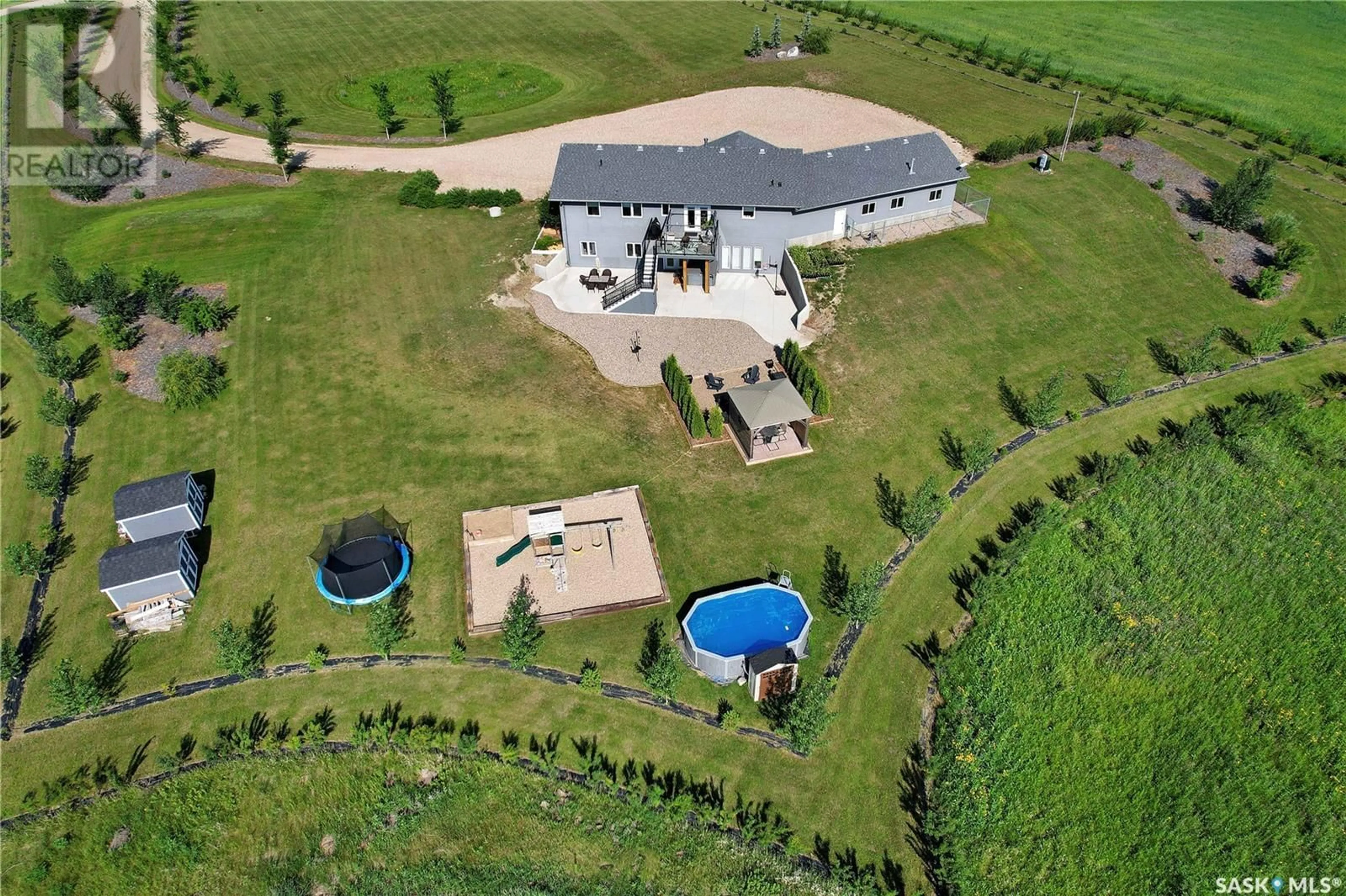 A pic from outside/outdoor area/front of a property/back of a property/a pic from drone, unknown for RIST ACREAGE, Corman Park Rm No. 344 Saskatchewan S7K3J8