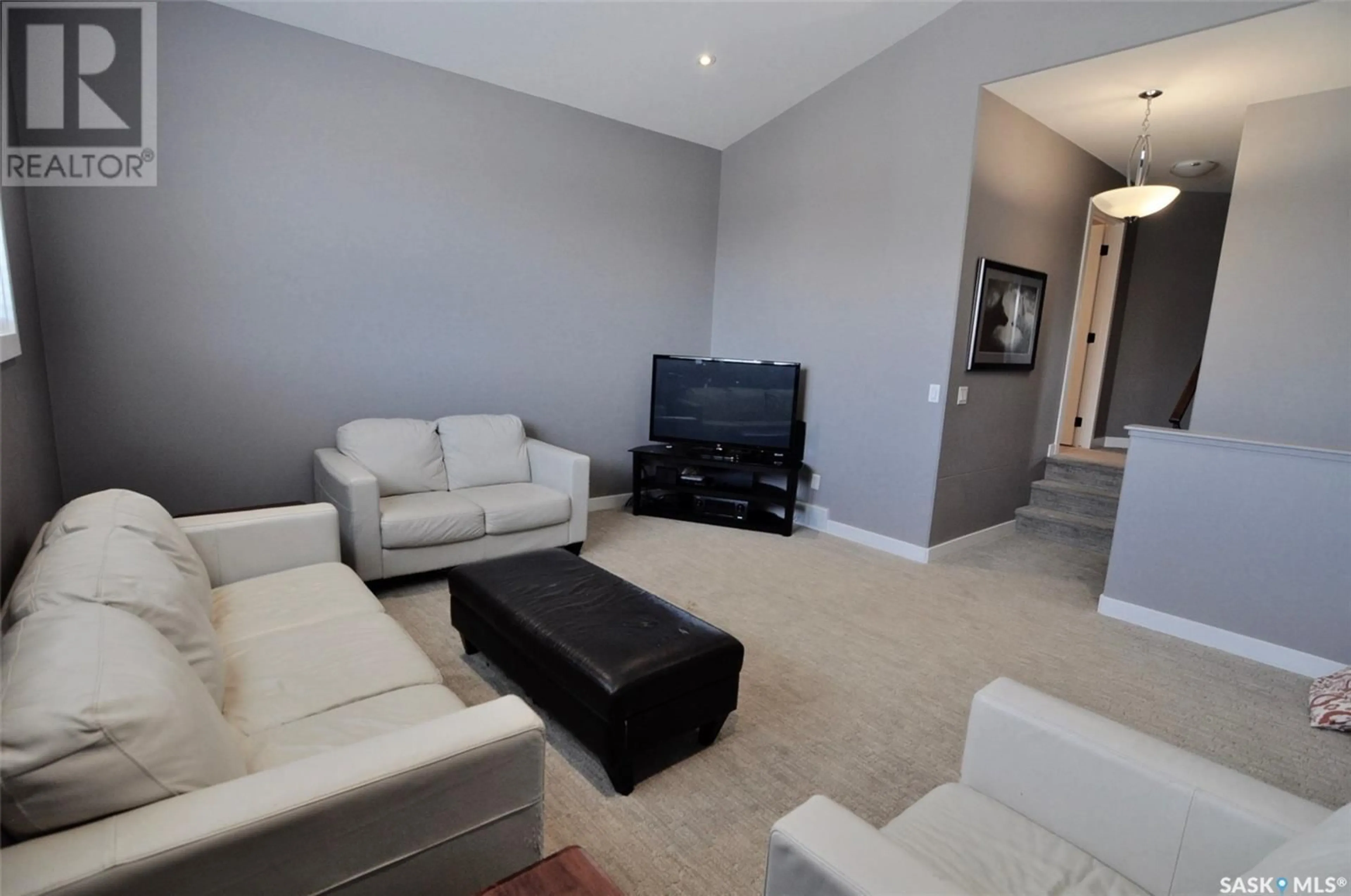 Living room with furniture, unknown for 467 VELTKAMP CRESCENT, Saskatoon Saskatchewan S7T0S1