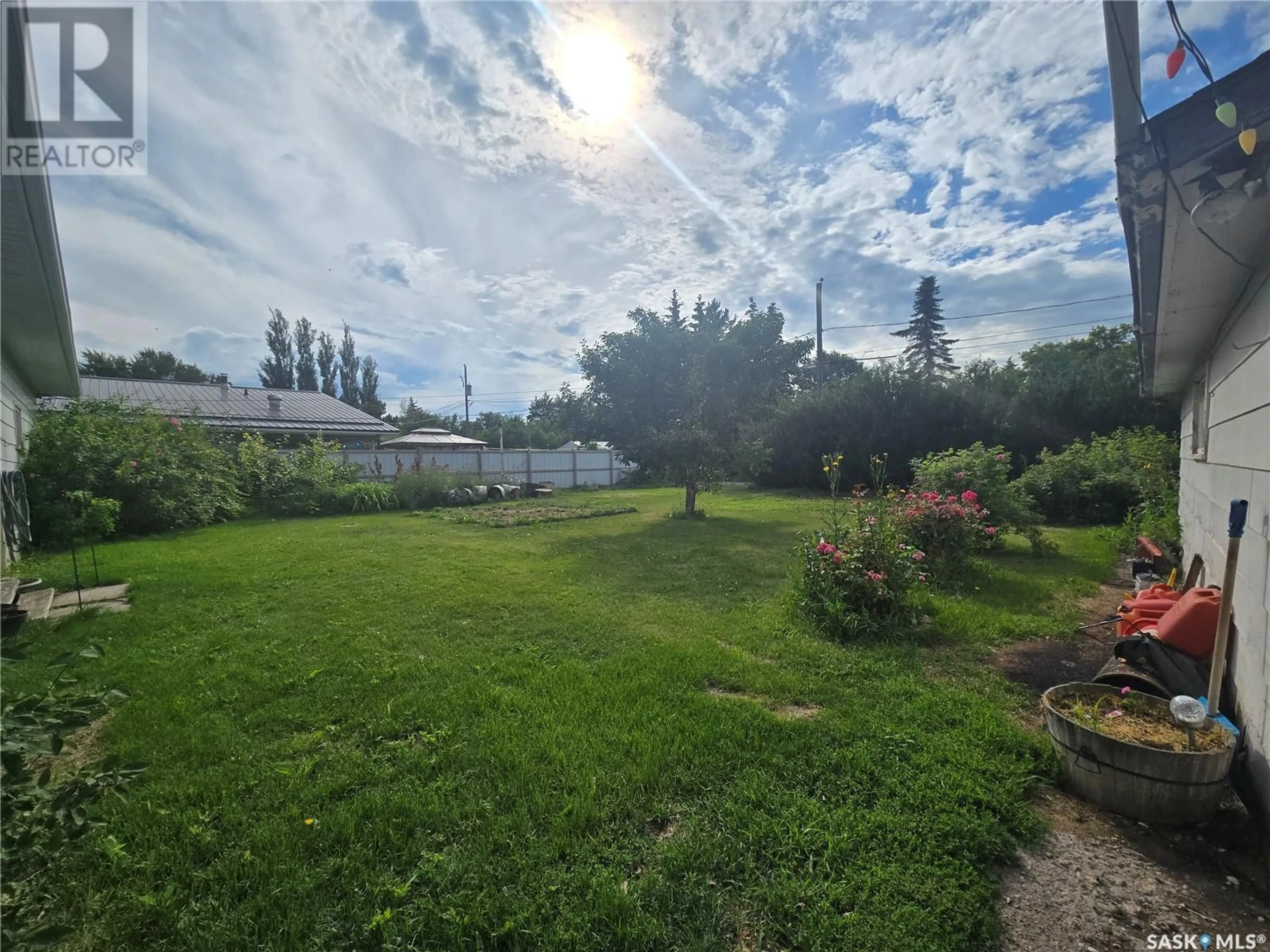A pic from outside/outdoor area/front of a property/back of a property/a pic from drone, unknown for 404 STANLEY STREET, Stoughton Saskatchewan S0G4T0
