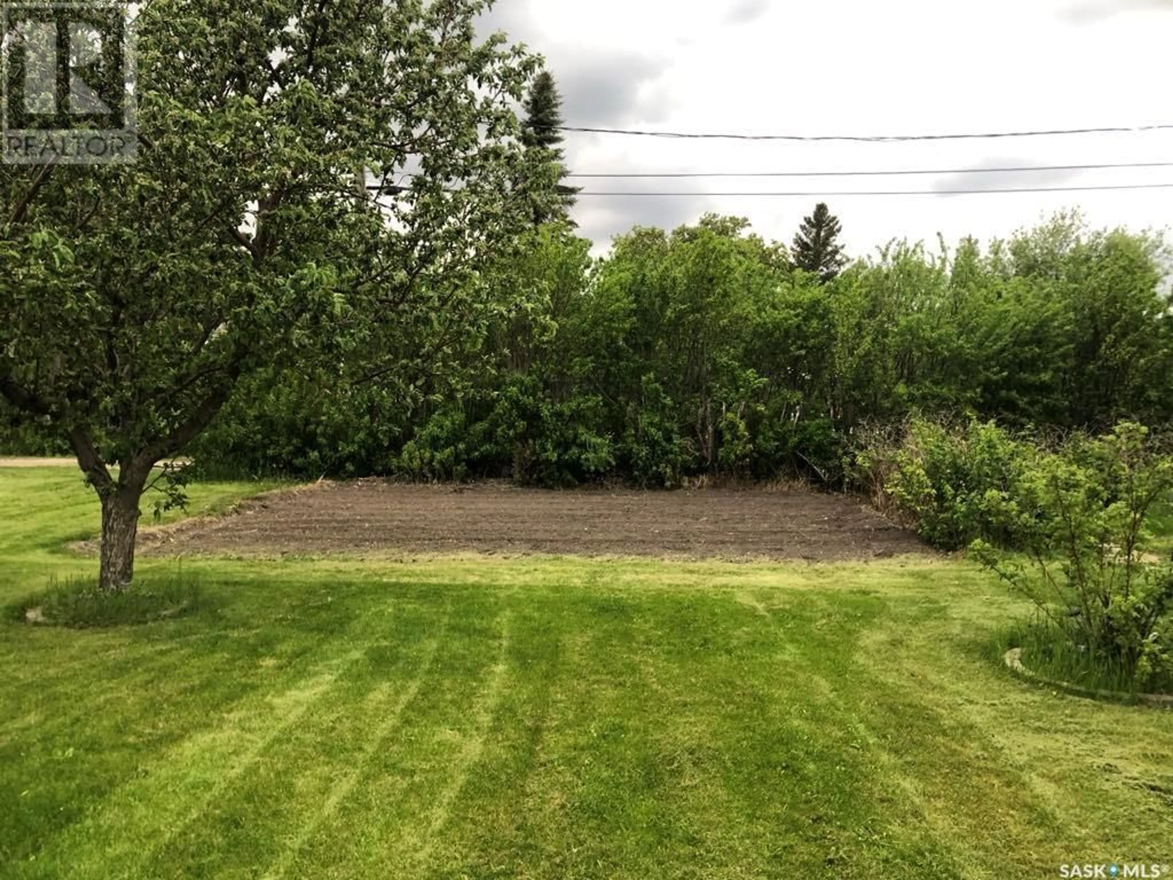 A pic from outside/outdoor area/front of a property/back of a property/a pic from drone, forest/trees view for 404 STANLEY STREET, Stoughton Saskatchewan S0G4T0
