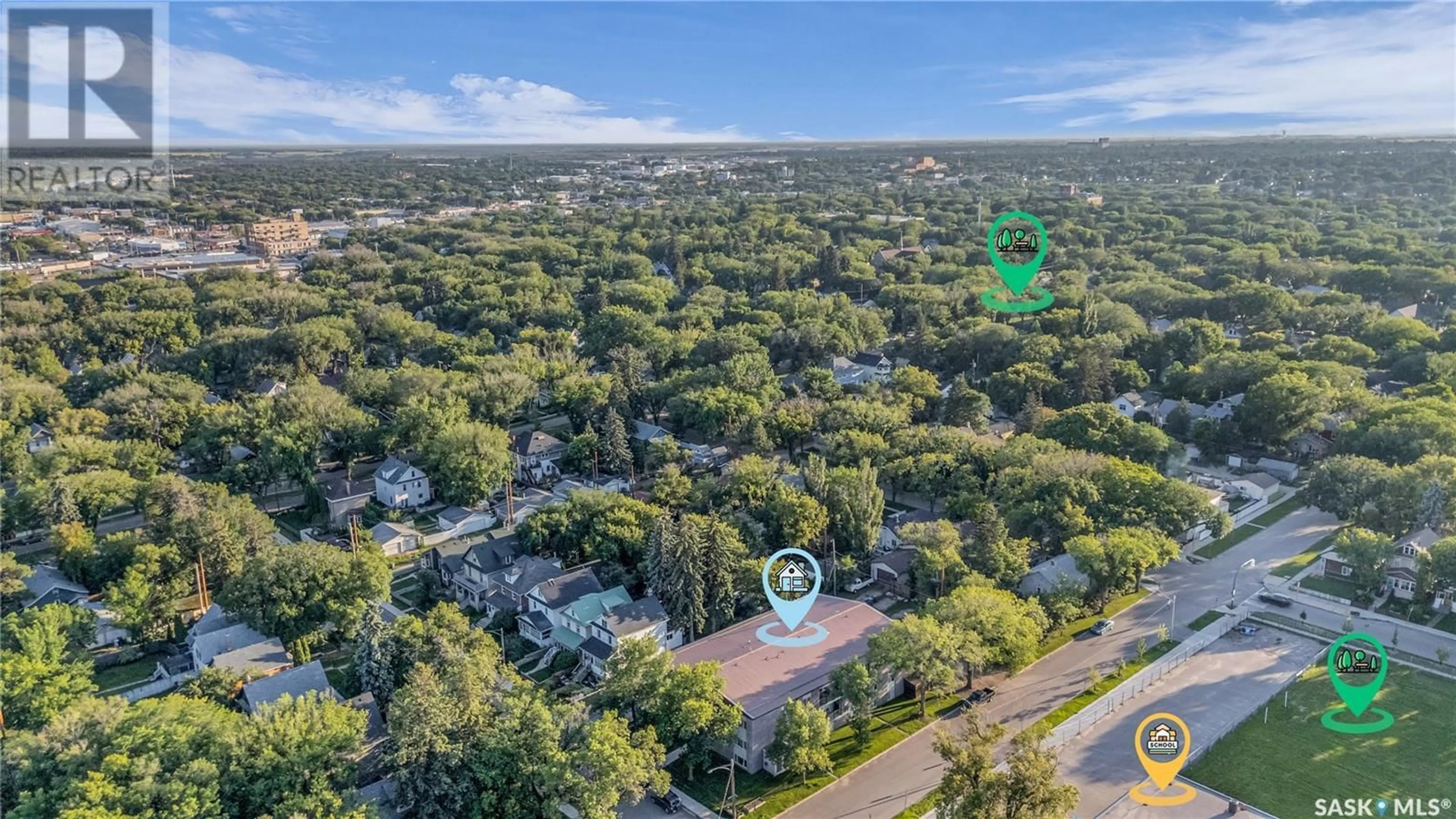 A pic from outside/outdoor area/front of a property/back of a property/a pic from drone, forest/trees view for 2A - 833 B AVENUE, Saskatoon Saskatchewan S7L1E6