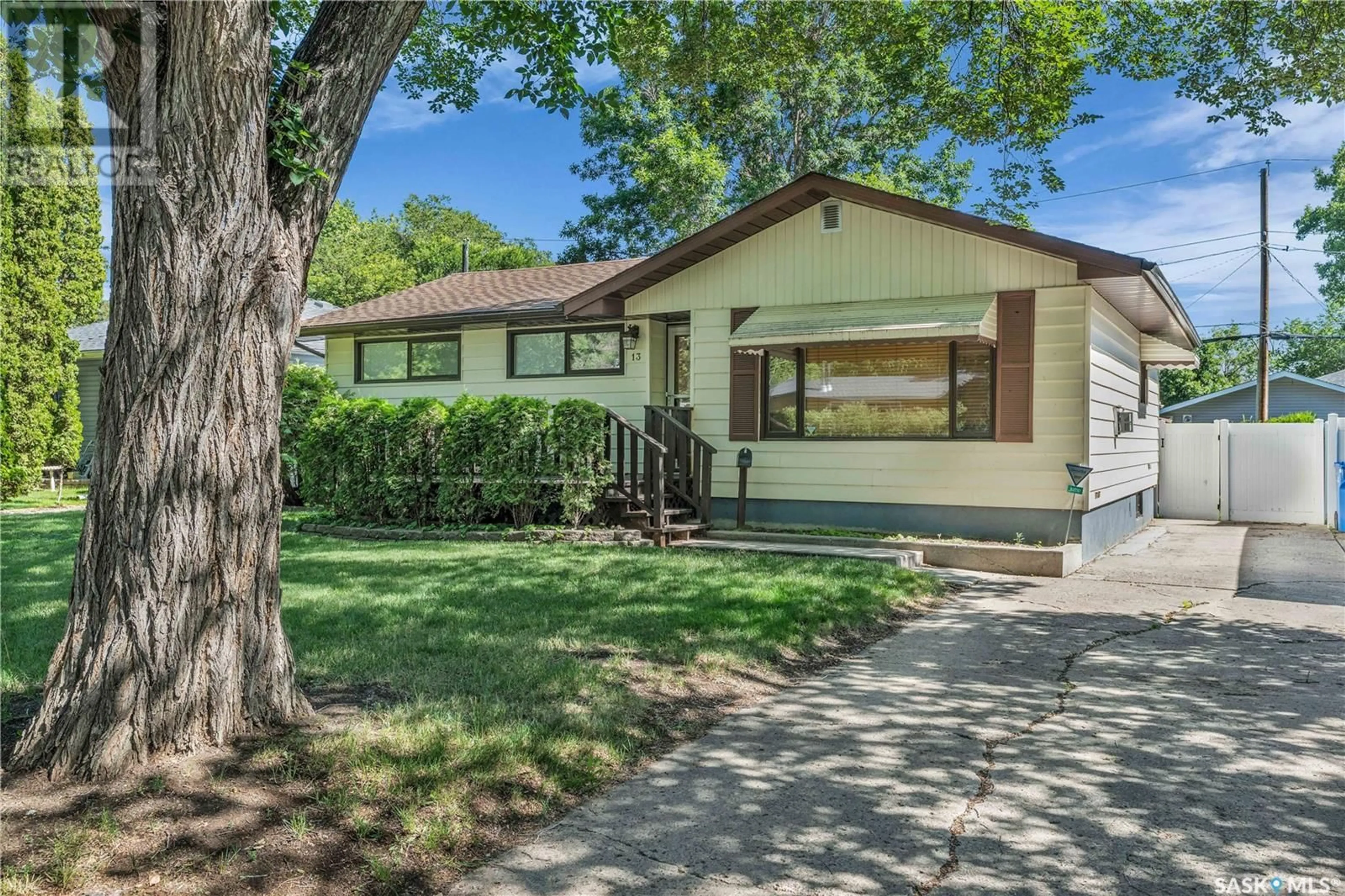 Home with vinyl exterior material, street for 13 MARSH CRESCENT, Regina Saskatchewan S4S5R3