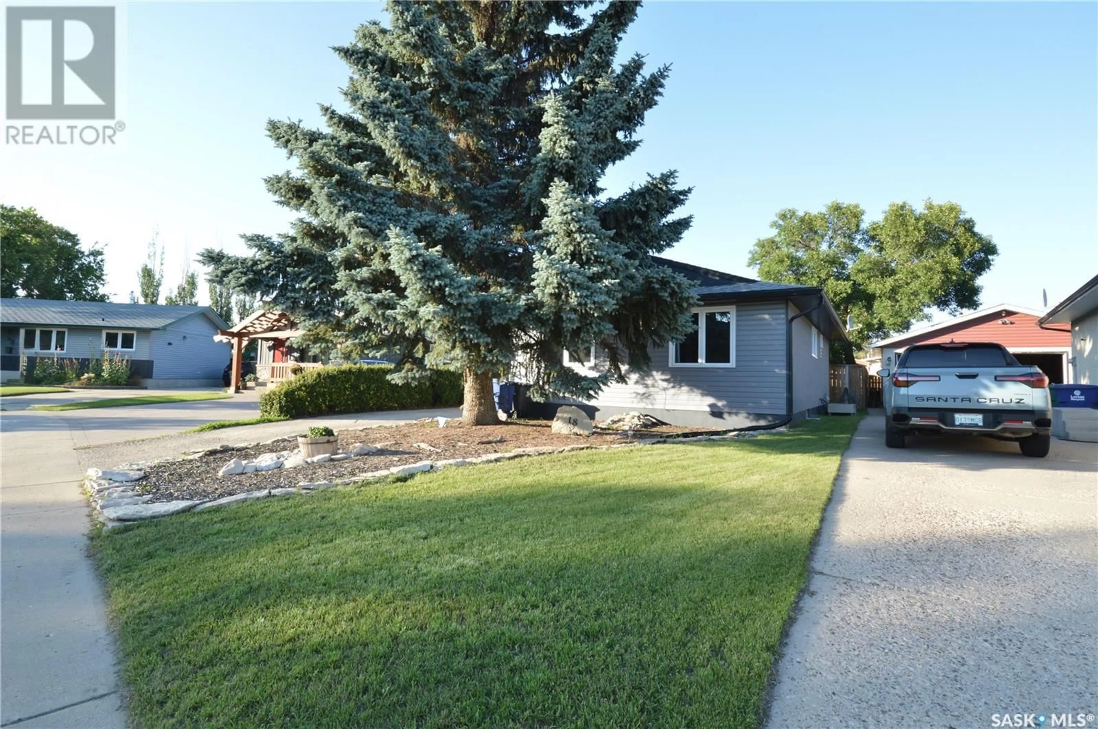 Home with vinyl exterior material, street for 18 PATTERSON CRESCENT, Saskatoon Saskatchewan S7L4Z9