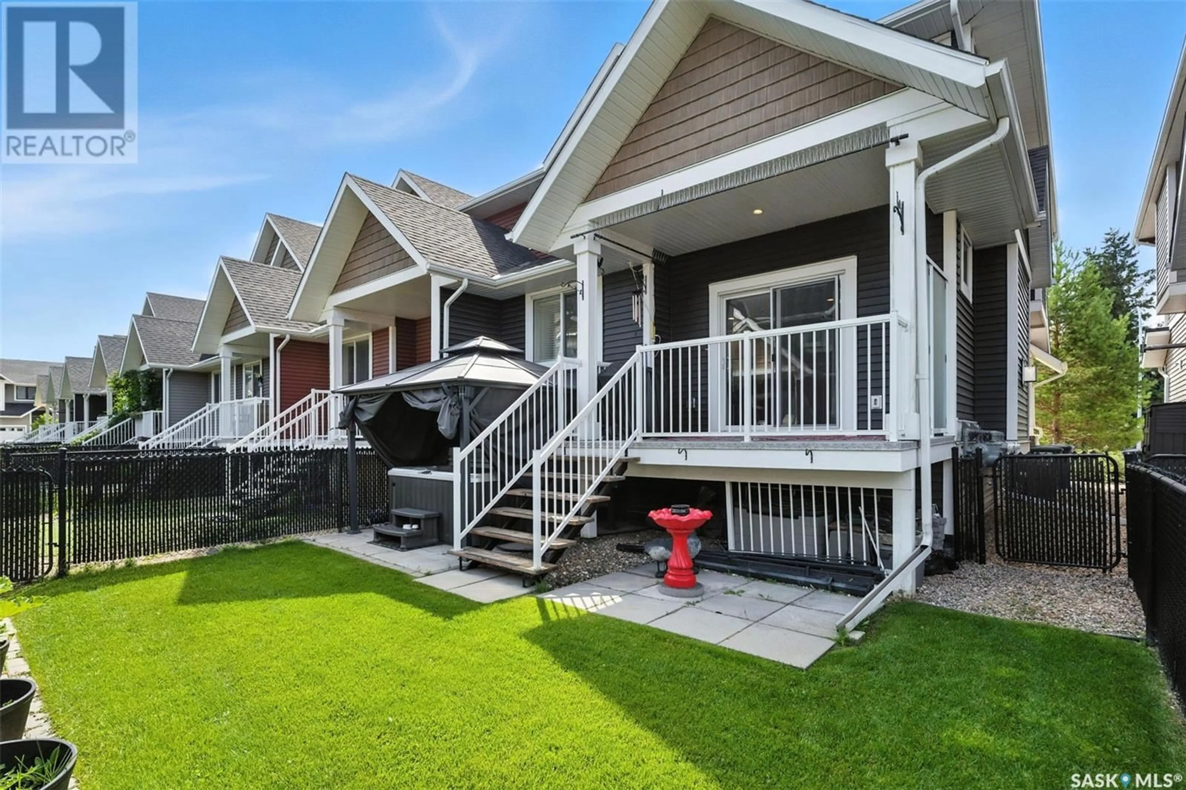 Home with vinyl exterior material, street for 3236 11TH STREET, Saskatoon Saskatchewan S7M5M4