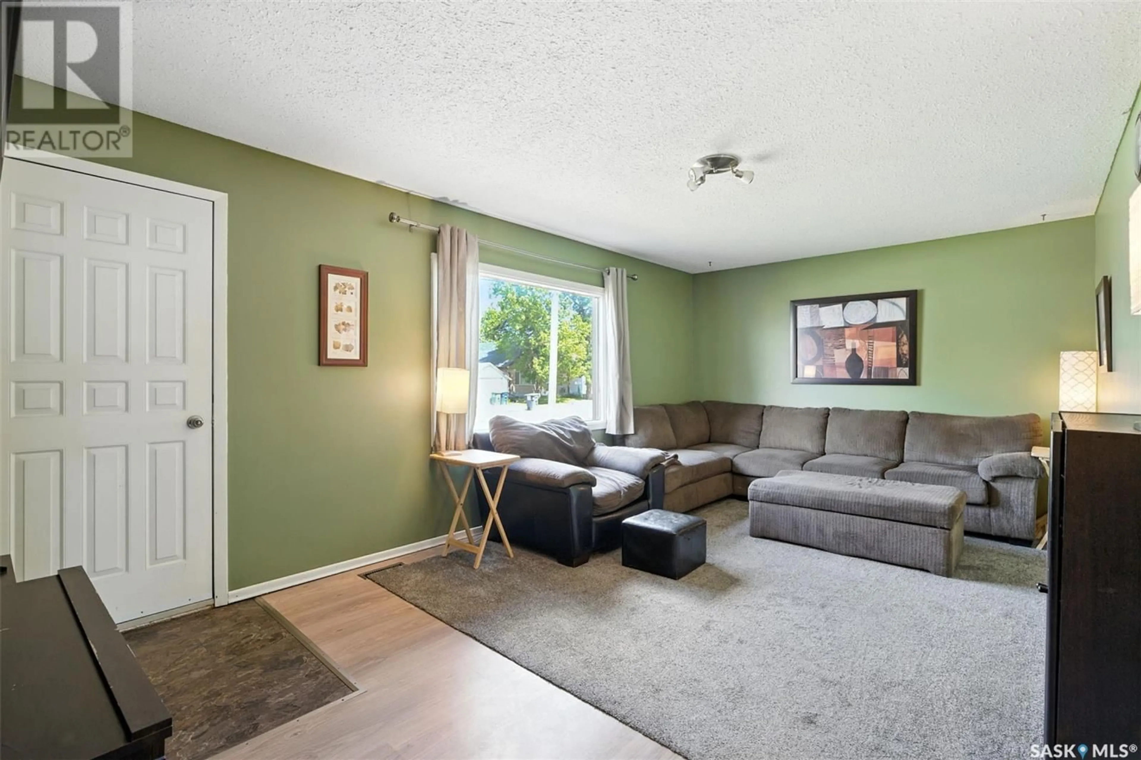 Living room with furniture, unknown for 125 2ND AVENUE, Osler Saskatchewan S0K3A0